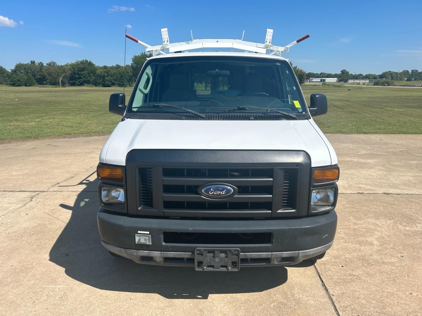 2010 White Ford E-Series Van E-250 (1FTNE2EL9AD) with an 5.4L V8 SOHC 16V engine, 4-Speed Automatic transmission, located at 17760 Hwy 62, Morris, OK, 74445, (918) 733-4887, 35.609104, -95.877060 - Photo#1