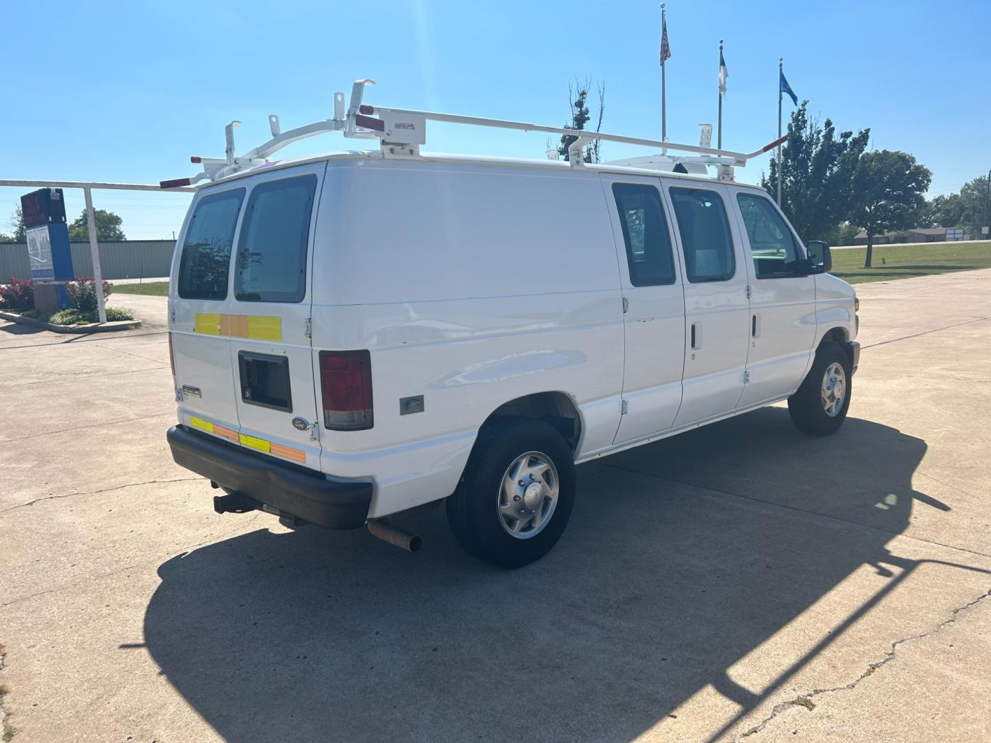 2010 White Ford E-Series Van E-250 (1FTNE2EL9AD) with an 5.4L V8 SOHC 16V engine, 4-Speed Automatic transmission, located at 17760 Hwy 62, Morris, OK, 74445, (918) 733-4887, 35.609104, -95.877060 - Photo#4