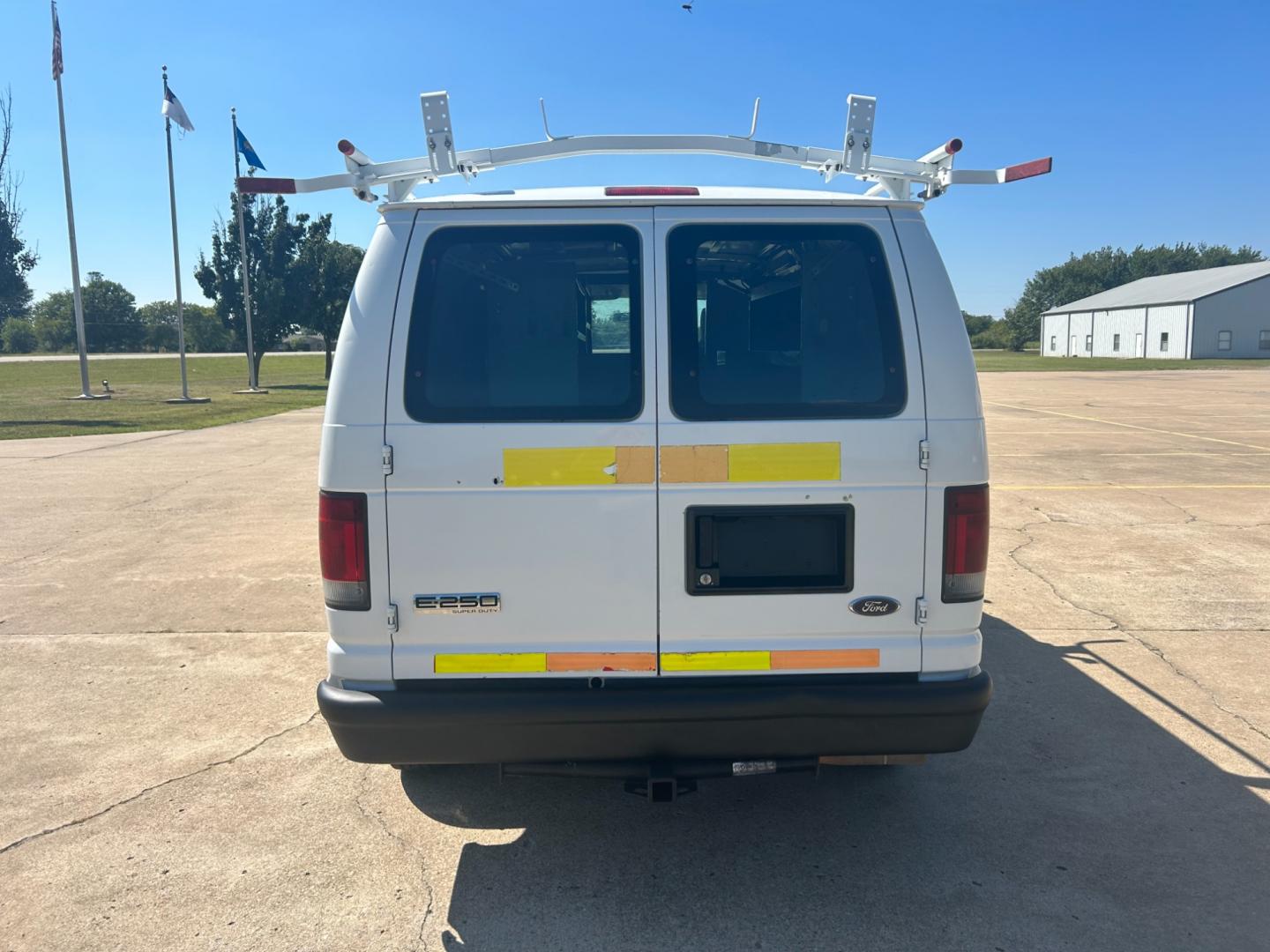 2010 White Ford E-Series Van E-250 (1FTNE2EL9AD) with an 5.4L V8 SOHC 16V engine, 4-Speed Automatic transmission, located at 17760 Hwy 62, Morris, OK, 74445, (918) 733-4887, 35.609104, -95.877060 - Photo#5