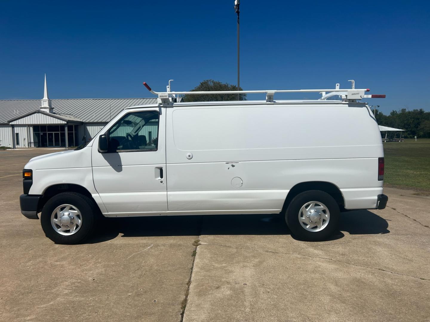 2010 White Ford E-Series Van E-250 (1FTNE2EL9AD) with an 5.4L V8 SOHC 16V engine, 4-Speed Automatic transmission, located at 17760 Hwy 62, Morris, OK, 74445, (918) 733-4887, 35.609104, -95.877060 - Photo#7