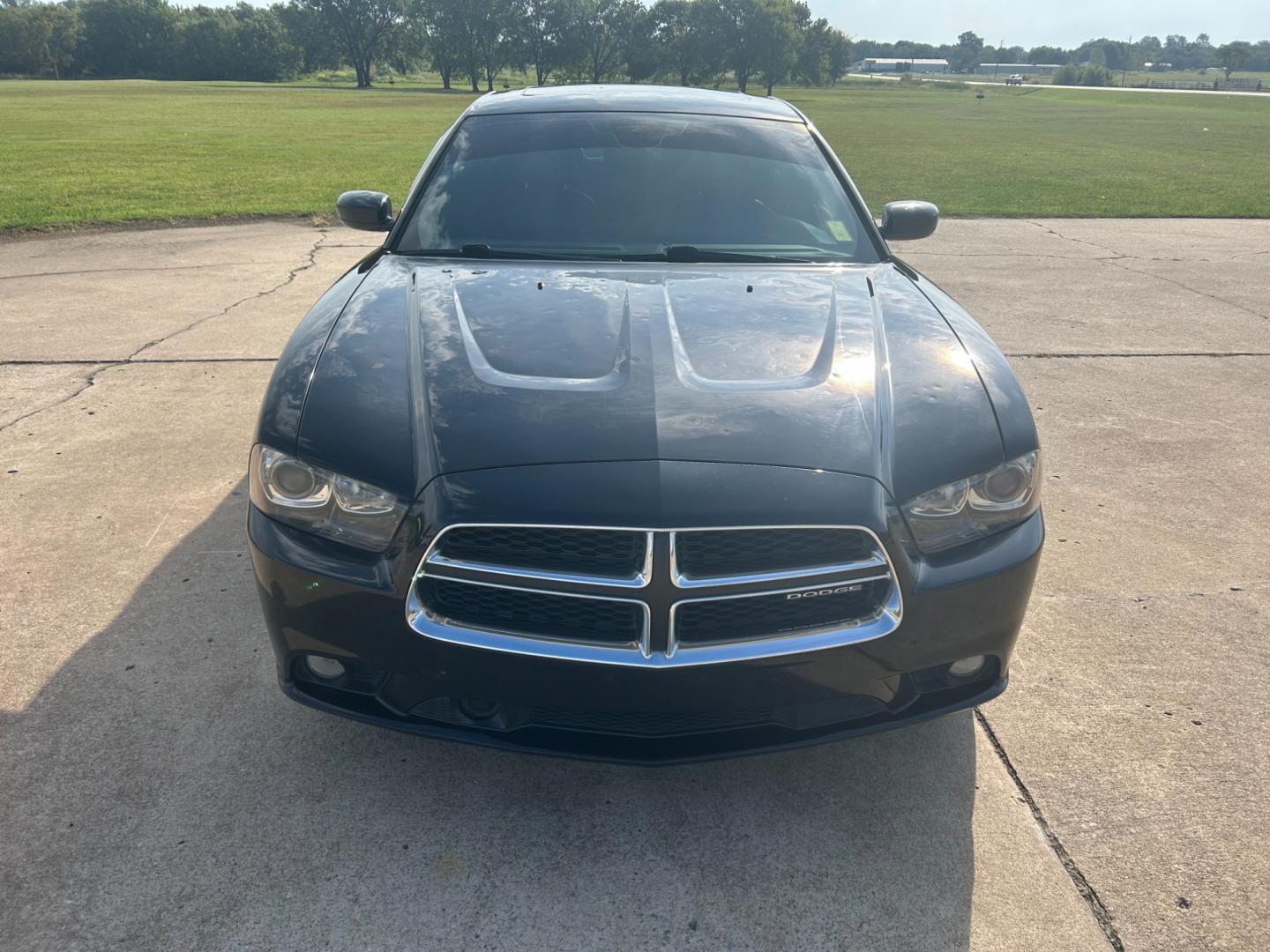 2011 BLACK /BLACK Dodge Charger R/T MAX (2B3CL5CT7BH) with an 5.7L V8 OHV 16V engine, 5-Speed Automatic transmission, located at 17760 Hwy 62, Morris, OK, 74445, (918) 733-4887, 35.609104, -95.877060 - 2011 DODGE CHARGER R/T MAX HAS THE 5.7L HEMI AND IS RWD, FEATURES REMOTE KEYLESS START, REMOTE KEYLESS ENTRY, POWER PUSH BUTTON START, POWER LOCKS, POWER WINDOWS, POWER SEATS, POWER MIRRORS, AM/FM STEREO, CD PLAYER, MP3 PLAYER, AUX PORT, USB PORT, SATILITE RADIO, PREMUIM SOUND SYSTEM, ADAPTIVE CRUIS - Photo#1