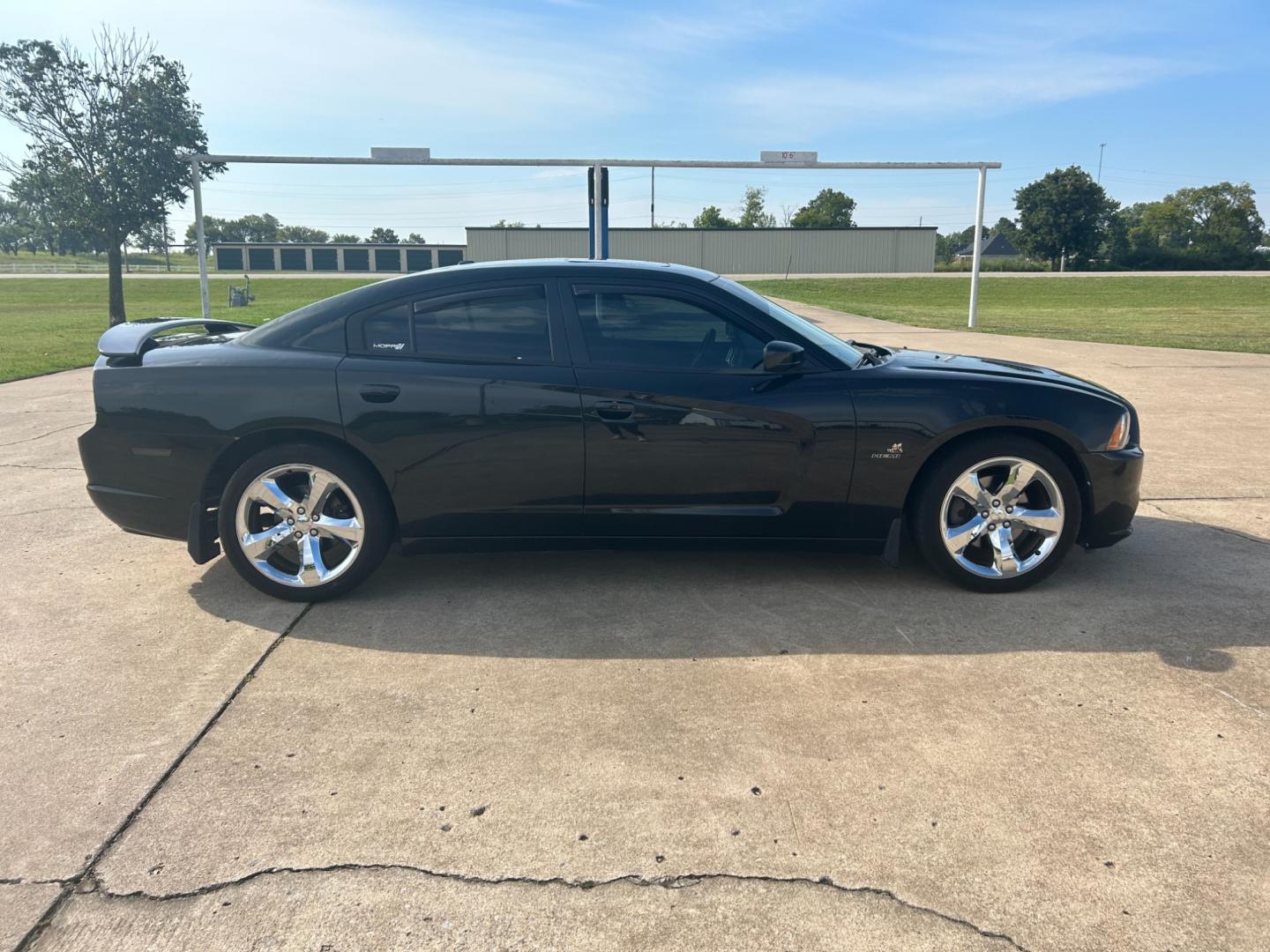 2011 BLACK /BLACK Dodge Charger R/T MAX (2B3CL5CT7BH) with an 5.7L V8 OHV 16V engine, 5-Speed Automatic transmission, located at 17760 Hwy 62, Morris, OK, 74445, (918) 733-4887, 35.609104, -95.877060 - 2011 DODGE CHARGER R/T MAX HAS THE 5.7L HEMI AND IS RWD, FEATURES REMOTE KEYLESS START, REMOTE KEYLESS ENTRY, POWER PUSH BUTTON START, POWER LOCKS, POWER WINDOWS, POWER SEATS, POWER MIRRORS, AM/FM STEREO, CD PLAYER, MP3 PLAYER, AUX PORT, USB PORT, SATILITE RADIO, PREMUIM SOUND SYSTEM, ADAPTIVE CRUIS - Photo#3