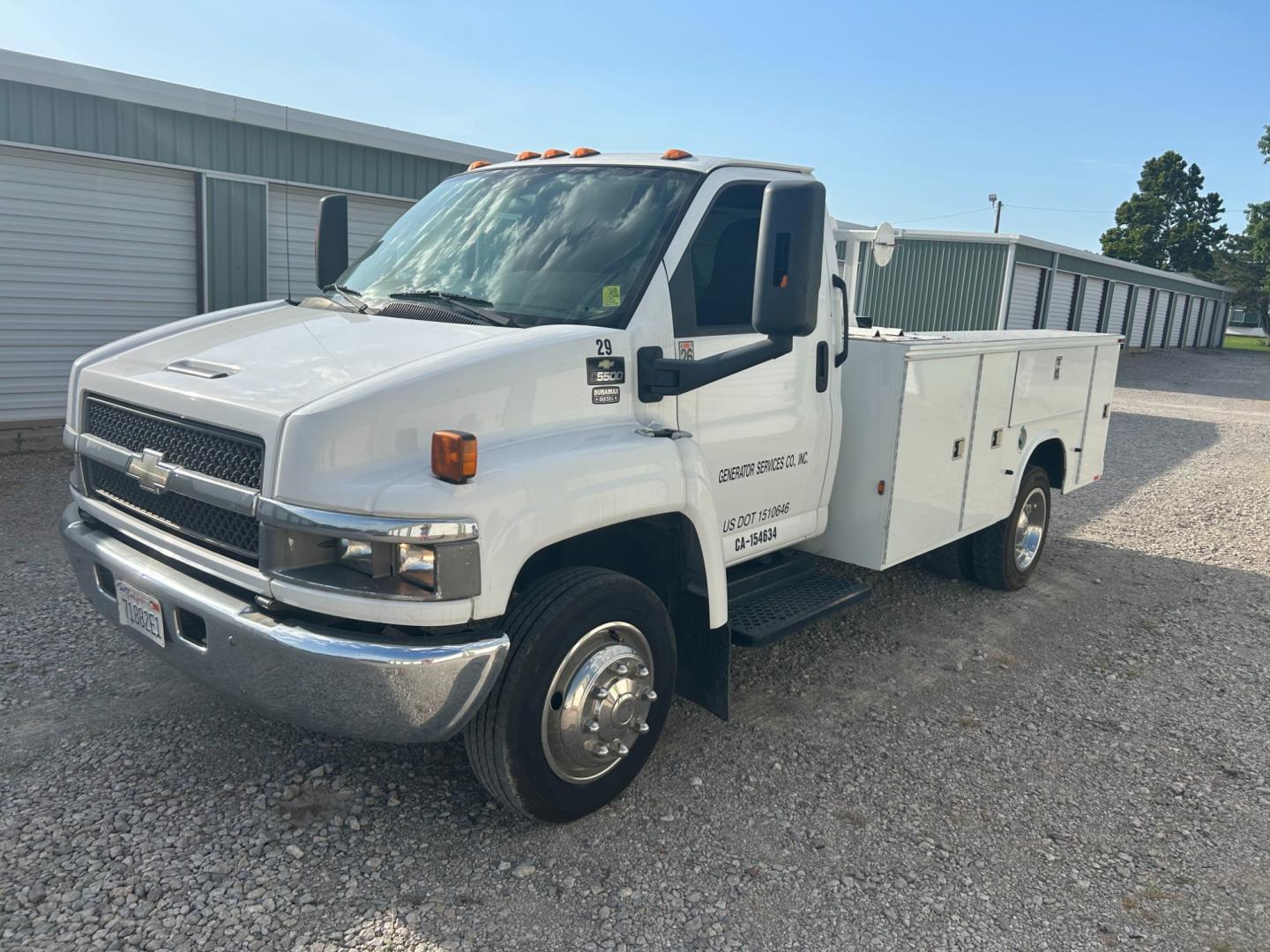 2009 White Chevrolet C5C042 C5500 (1GBE5C1959F) with an 6.6L V8 OHV 32V TURBO DIESEL engine, located at 17760 Hwy 62, Morris, OK, 74445, (918) 733-4887, 35.609104, -95.877060 - Photo#0