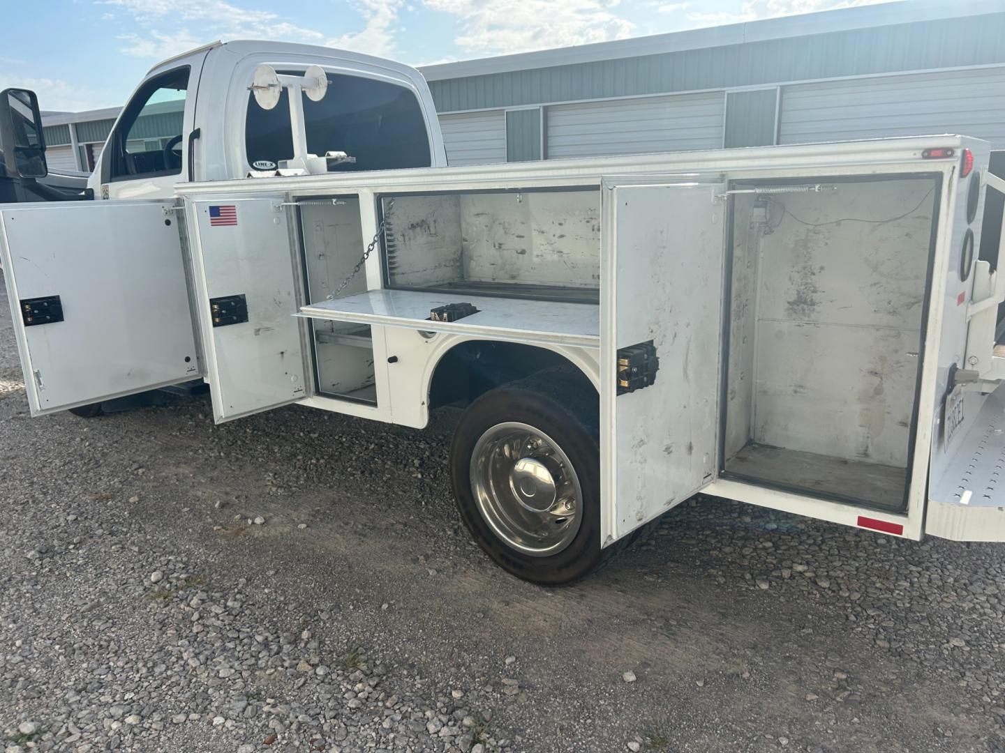 2009 White Chevrolet C5C042 C5500 (1GBE5C1959F) with an 6.6L V8 OHV 32V TURBO DIESEL engine, located at 17760 Hwy 62, Morris, OK, 74445, (918) 733-4887, 35.609104, -95.877060 - Photo#13