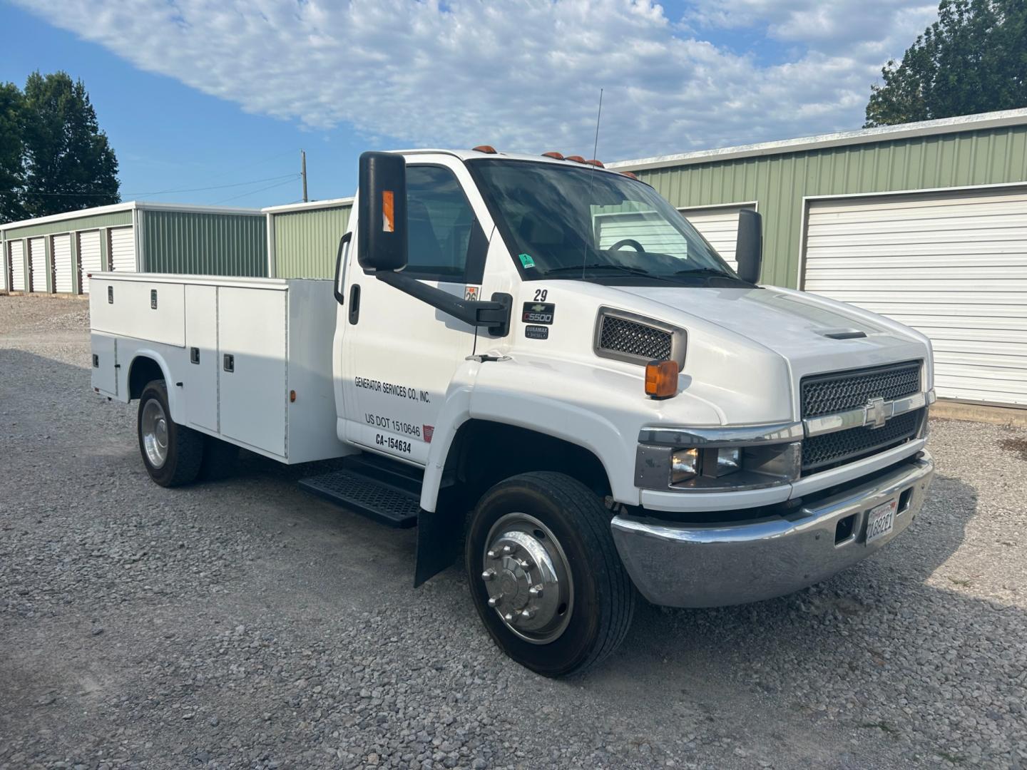 2009 White Chevrolet C5C042 C5500 (1GBE5C1959F) with an 6.6L V8 OHV 32V TURBO DIESEL engine, located at 17760 Hwy 62, Morris, OK, 74445, (918) 733-4887, 35.609104, -95.877060 - Photo#2