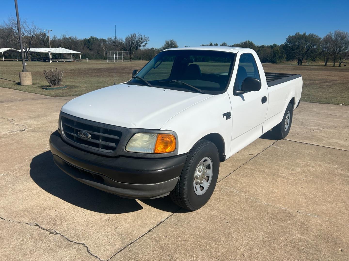 2004 White Ford F-150 Regular Cab 2WD (2FDPF17M64C) with an 5.4L V8 SOHC engine, located at 17760 Hwy 62, Morris, OK, 74445, (918) 733-4887, 35.609104, -95.877060 - 2004 FORD F-150 REGULAR CAB 2WD DEDICATED CNG (ONLY RUNS ON COMPRESSED NATURAL GAS). IT FEATURES MANUAL SEATS, MANUAL LOCKS, MANUAL WINDOWS, MANUAL MIRRORS, AM/FM STEREO, CASSETTE PLAYER, CRUISE CONTROL. A PREMIER ALTERNATIVE FUEL CONVERSION THAT IS EPA-APPROVED. EXTREMELY CLEAN-BURNING AND EFFICIE - Photo#0