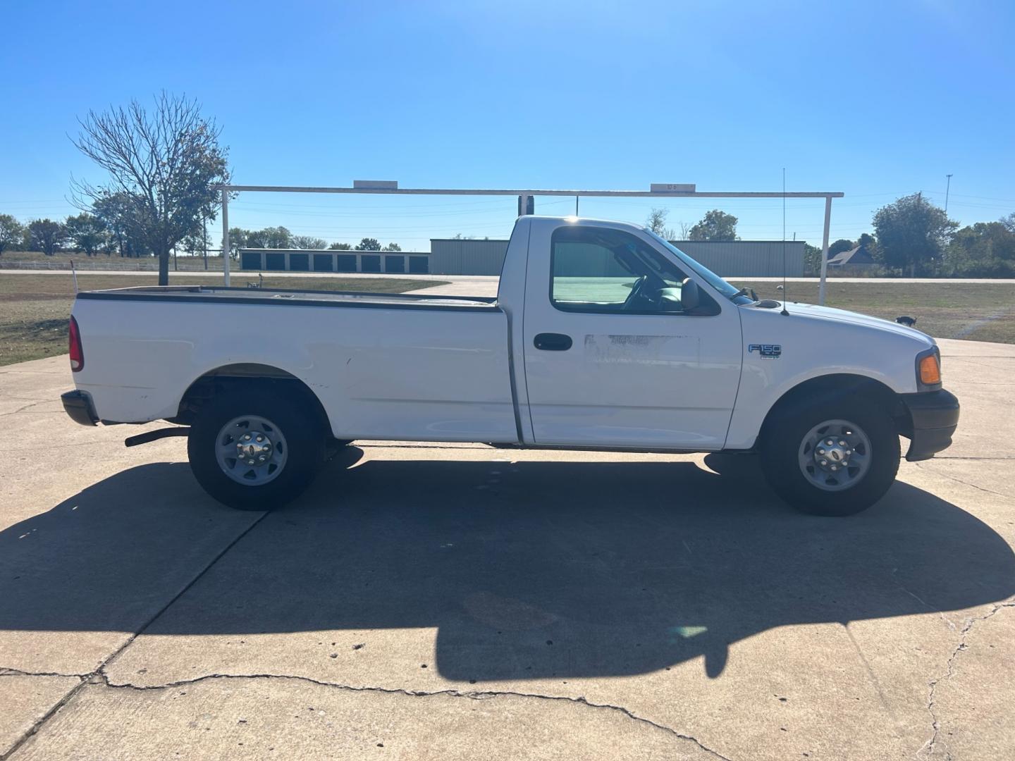 2004 White Ford F-150 Regular Cab 2WD (2FDPF17M64C) with an 5.4L V8 SOHC engine, located at 17760 Hwy 62, Morris, OK, 74445, (918) 733-4887, 35.609104, -95.877060 - 2004 FORD F-150 REGULAR CAB 2WD DEDICATED CNG (ONLY RUNS ON COMPRESSED NATURAL GAS). IT FEATURES MANUAL SEATS, MANUAL LOCKS, MANUAL WINDOWS, MANUAL MIRRORS, AM/FM STEREO, CASSETTE PLAYER, CRUISE CONTROL. A PREMIER ALTERNATIVE FUEL CONVERSION THAT IS EPA-APPROVED. EXTREMELY CLEAN-BURNING AND EFFICIE - Photo#3