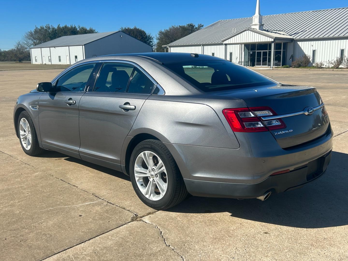 2014 GRAY Ford Taurus SEL FWD (1FAHP2E81EG) with an 3.5L V6 DOHC 24V engine, 6-Speed Automatic transmission, located at 17760 Hwy 62, Morris, OK, 74445, (918) 733-4887, 35.609104, -95.877060 - Photo#2