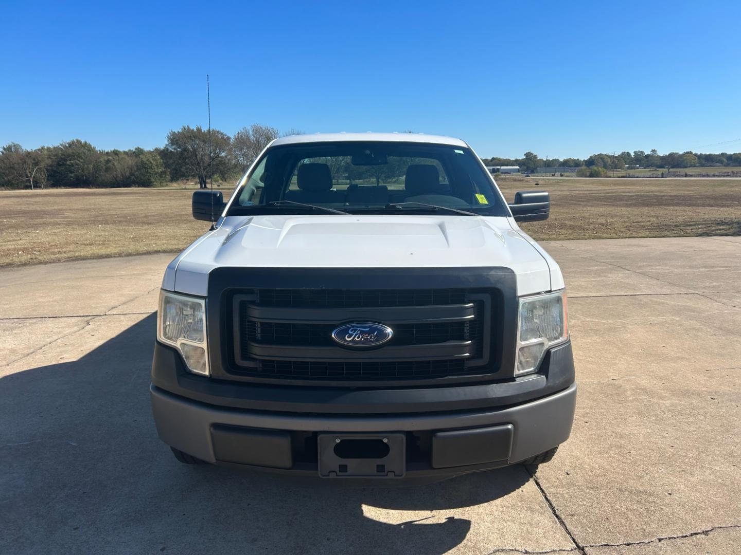 2014 White Ford F-150 STX 6.5-ft. Bed 2WD (1FTMF1CM2EK) with an 3.7L V6 DOHC 24V engine, 6-Speed Automatic transmission, located at 17760 Hwy 62, Morris, OK, 74445, (918) 733-4887, 35.609104, -95.877060 - Photo#1