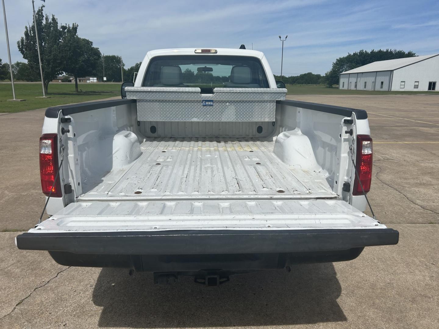 2013 White /GRAY Ford F250 SUPER DUTY 2WD (1FTB2A66DEB) with an 6.2L V8 engine, AUTOMATIC transmission, located at 17760 Hwy 62, Morris, OK, 74445, (918) 733-4887, 35.609104, -95.877060 - 2013 F250 SUPER DUTY IS A DEDICATED CNG. THIS TRUCK HAS A 6.2L V8 ENGINE, FEATURES MANUAL SEAT, MANUAL WINDOWS, MANUAL LOCKS, MANUAL MIRRORS, AM FM RADIO, FACTORY TRAILER BREAKS, TRACTION CONTROL, AND TRAILER HITCH. CLEAN TITLE, 73,260 MILES, FIRESTONE 245/75R17 TIRES. $12,900 CALL RUSS OR JONA AT - Photo#14