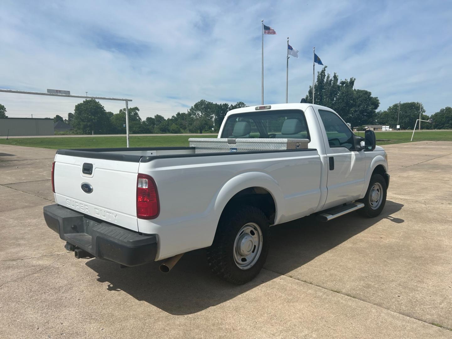 2013 White /GRAY Ford F250 SUPER DUTY 2WD (1FTB2A66DEB) with an 6.2L V8 engine, AUTOMATIC transmission, located at 17760 Hwy 62, Morris, OK, 74445, (918) 733-4887, 35.609104, -95.877060 - 2013 F250 SUPER DUTY IS A DEDICATED CNG. THIS TRUCK HAS A 6.2L V8 ENGINE, FEATURES MANUAL SEAT, MANUAL WINDOWS, MANUAL LOCKS, MANUAL MIRRORS, AM FM RADIO, FACTORY TRAILER BREAKS, TRACTION CONTROL, AND TRAILER HITCH. CLEAN TITLE, 73,260 MILES, FIRESTONE 245/75R17 TIRES. $12,900 CALL RUSS OR JONA AT - Photo#4