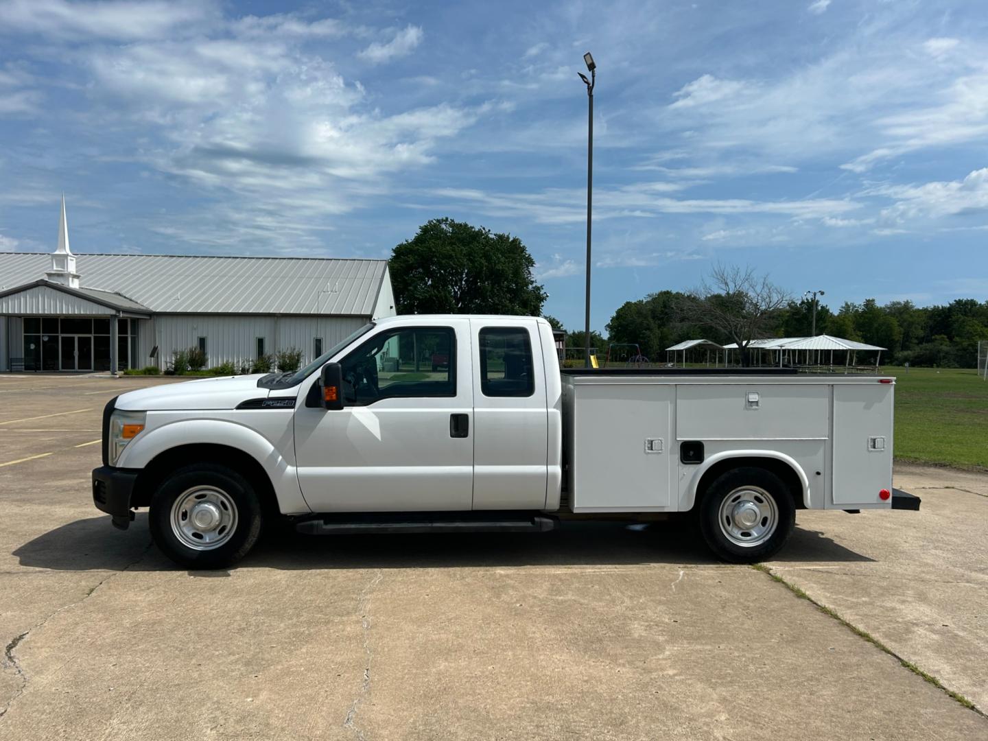 2012 White /Gray Ford F-250 SD SUPER DUTY (1FT7X2A66CE) with an 6.2L V8 OHV 16V engine, AUTOMATIC transmission, located at 17760 Hwy 62, Morris, OK, 74445, (918) 733-4887, 35.609104, -95.877060 - 2012 FORD F250 SUPERCAB HAS THE 6.2L V8 ENGINE AND IS 2WD IT IS DEDICATED CNG (COMPRESSED NATURAL GAS) FEATURES MANUAL SEATS, POWER LOCKS, POWER WINDOWS, POWER MIRRORS, AM/FM STEREO, TILT WHEEL, CLOTH INTERIOR,CRUISE CONTROL, TRACTION CONTROL, TOOL BED WITH STORAGE, BED LINER, AND FIRESTONE TIRES 2 - Photo#7