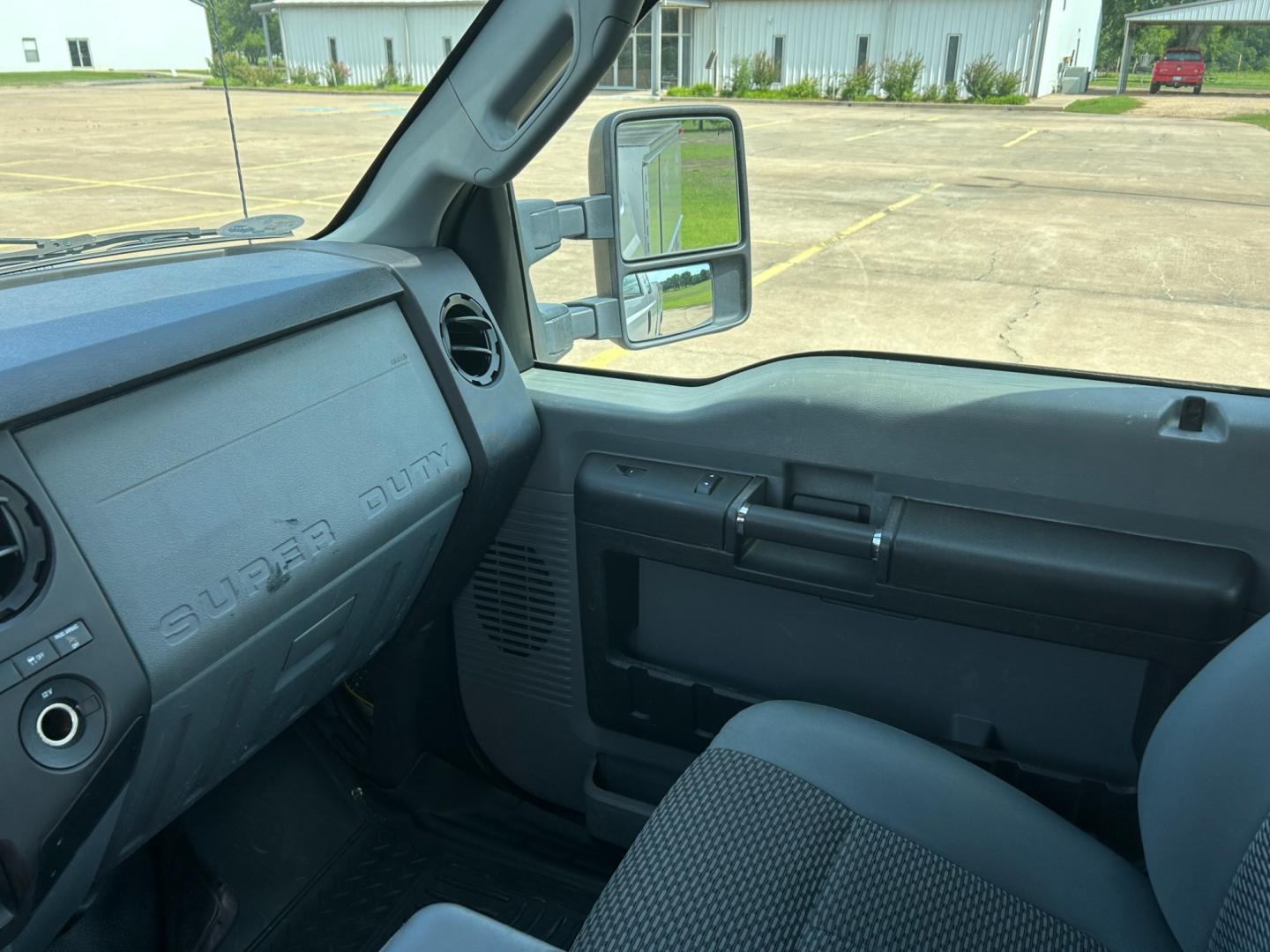 2012 White /Gray Ford F-250 SD SUPER DUTY (1FT7X2A66CE) with an 6.2L V8 OHV 16V engine, AUTOMATIC transmission, located at 17760 Hwy 62, Morris, OK, 74445, (918) 733-4887, 35.609104, -95.877060 - 2012 FORD F250 SUPERCAB HAS THE 6.2L V8 ENGINE AND IS 2WD IT IS DEDICATED CNG (COMPRESSED NATURAL GAS) FEATURES MANUAL SEATS, POWER LOCKS, POWER WINDOWS, POWER MIRRORS, AM/FM STEREO, TILT WHEEL, CLOTH INTERIOR,CRUISE CONTROL, TRACTION CONTROL, TOOL BED WITH STORAGE, BED LINER, AND FIRESTONE TIRES 2 - Photo#9