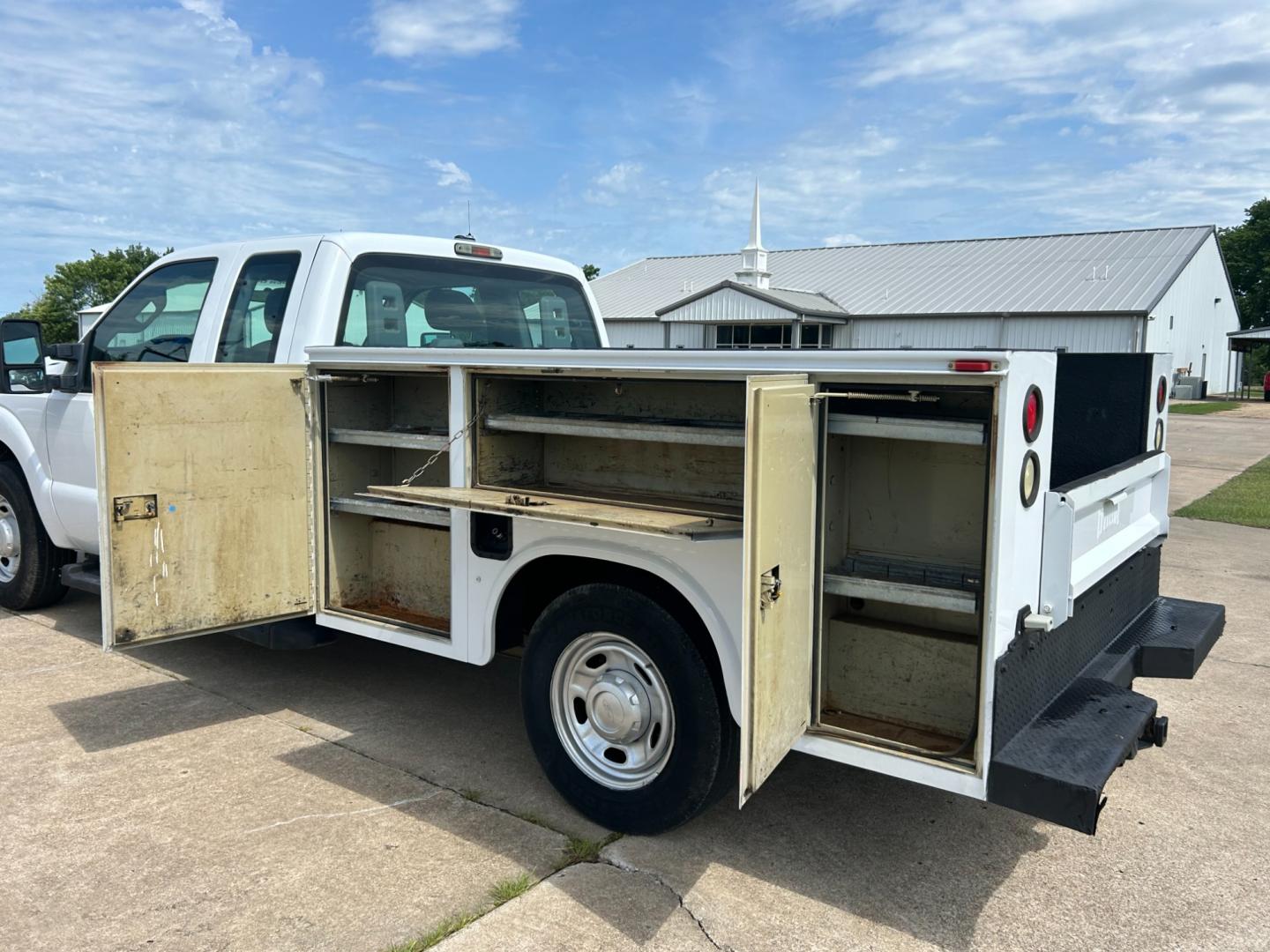 2012 White /Gray Ford F-250 SD SUPER DUTY (1FT7X2A66CE) with an 6.2L V8 OHV 16V engine, AUTOMATIC transmission, located at 17760 Hwy 62, Morris, OK, 74445, (918) 733-4887, 35.609104, -95.877060 - 2012 FORD F250 SUPERCAB HAS THE 6.2L V8 ENGINE AND IS 2WD IT IS DEDICATED CNG (COMPRESSED NATURAL GAS) FEATURES MANUAL SEATS, POWER LOCKS, POWER WINDOWS, POWER MIRRORS, AM/FM STEREO, TILT WHEEL, CLOTH INTERIOR,CRUISE CONTROL, TRACTION CONTROL, TOOL BED WITH STORAGE, BED LINER, AND FIRESTONE TIRES 2 - Photo#14