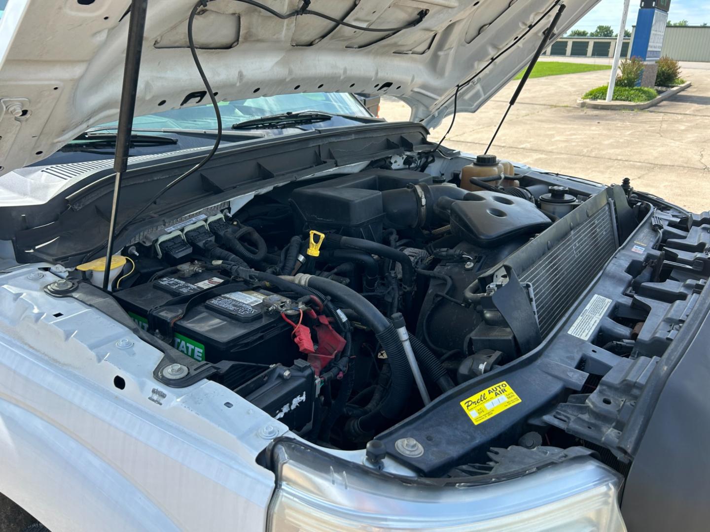 2012 White /Gray Ford F-250 SD SUPER DUTY (1FT7X2A66CE) with an 6.2L V8 OHV 16V engine, AUTOMATIC transmission, located at 17760 Hwy 62, Morris, OK, 74445, (918) 733-4887, 35.609104, -95.877060 - 2012 FORD F250 SUPERCAB HAS THE 6.2L V8 ENGINE AND IS 2WD IT IS DEDICATED CNG (COMPRESSED NATURAL GAS) FEATURES MANUAL SEATS, POWER LOCKS, POWER WINDOWS, POWER MIRRORS, AM/FM STEREO, TILT WHEEL, CLOTH INTERIOR,CRUISE CONTROL, TRACTION CONTROL, TOOL BED WITH STORAGE, BED LINER, AND FIRESTONE TIRES 2 - Photo#19