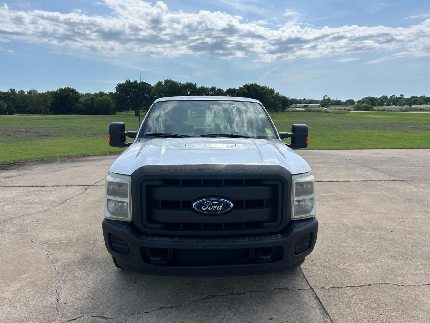 2012 White /Gray Ford F-250 SD SUPER DUTY (1FT7X2A66CE) with an 6.2L V8 OHV 16V engine, AUTOMATIC transmission, located at 17760 Hwy 62, Morris, OK, 74445, (918) 733-4887, 35.609104, -95.877060 - 2012 FORD F250 SUPERCAB HAS THE 6.2L V8 ENGINE AND IS 2WD IT IS DEDICATED CNG (COMPRESSED NATURAL GAS) FEATURES MANUAL SEATS, POWER LOCKS, POWER WINDOWS, POWER MIRRORS, AM/FM STEREO, TILT WHEEL, CLOTH INTERIOR,CRUISE CONTROL, TRACTION CONTROL, TOOL BED WITH STORAGE, BED LINER, AND FIRESTONE TIRES 2 - Photo#1