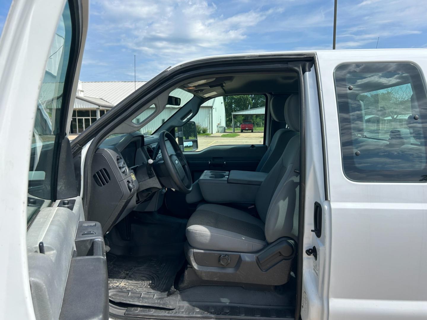 2012 White /Gray Ford F-250 SD SUPER DUTY (1FT7X2A66CE) with an 6.2L V8 OHV 16V engine, AUTOMATIC transmission, located at 17760 Hwy 62, Morris, OK, 74445, (918) 733-4887, 35.609104, -95.877060 - 2012 FORD F250 SUPERCAB HAS THE 6.2L V8 ENGINE AND IS 2WD IT IS DEDICATED CNG (COMPRESSED NATURAL GAS) FEATURES MANUAL SEATS, POWER LOCKS, POWER WINDOWS, POWER MIRRORS, AM/FM STEREO, TILT WHEEL, CLOTH INTERIOR,CRUISE CONTROL, TRACTION CONTROL, TOOL BED WITH STORAGE, BED LINER, AND FIRESTONE TIRES 2 - Photo#8