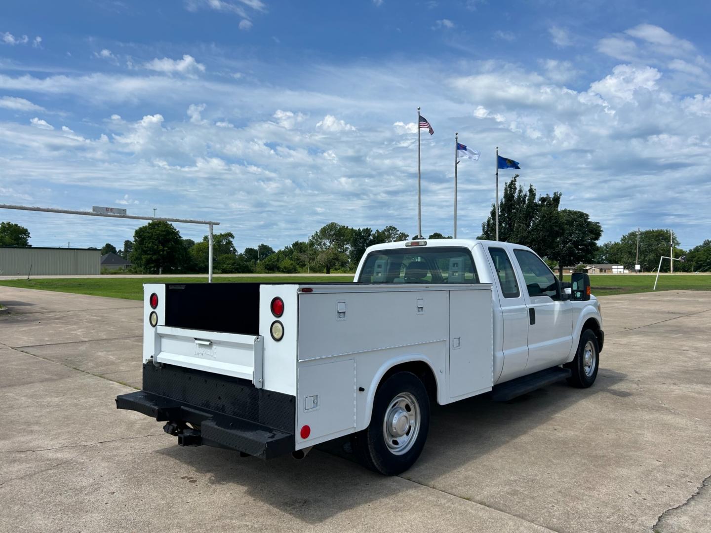 2012 White /Gray Ford F-250 SD SUPER DUTY (1FT7X2A66CE) with an 6.2L V8 OHV 16V engine, AUTOMATIC transmission, located at 17760 Hwy 62, Morris, OK, 74445, (918) 733-4887, 35.609104, -95.877060 - 2012 FORD F250 SUPERCAB HAS THE 6.2L V8 ENGINE AND IS 2WD IT IS DEDICATED CNG (COMPRESSED NATURAL GAS) FEATURES MANUAL SEATS, POWER LOCKS, POWER WINDOWS, POWER MIRRORS, AM/FM STEREO, TILT WHEEL, CLOTH INTERIOR,CRUISE CONTROL, TRACTION CONTROL, TOOL BED WITH STORAGE, BED LINER, AND FIRESTONE TIRES 2 - Photo#4