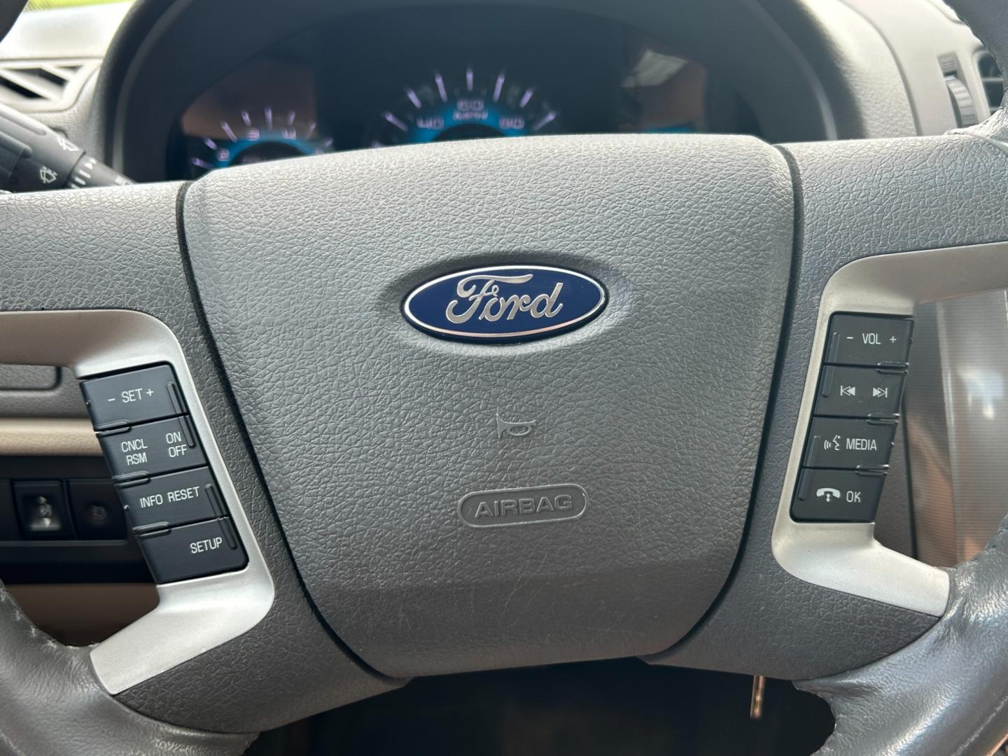 2010 White /TAN Ford Fusion SEL (3FAHP0JA5AR) with an 2.5L L4 DOHC 16V engine, AUTOMATIC transmission, located at 17760 Hwy 62, Morris, OK, 74445, (918) 733-4887, 35.609104, -95.877060 - 2010 FORD FUSION BI- FUEL CNG (COMPRESSED NATURAL GAS) OR GASOLINE HAS A 2.5L 4 CYLINDER ENGINE AND 2WD. FEATURES KEYLESS ENTERY, POWER SEATS,POWER WINDOWS, POWER LOCKS, POWER MIRRORS, LEATHER INTERIOR, AM/FM RADIO, SIRIUS RADIO, CD PLAYER, AUXILIARY PORT, BLUETOOTH, DUAL TEMPATURE CONTROL, HEATED S - Photo#14