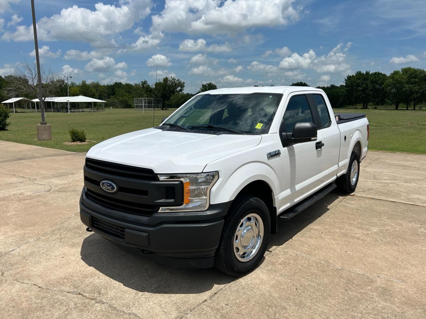 2018 White /Gray Ford F-150 EXTENDED CAB (1FTFX1E52JK) with an 5.0L V8 OHV 16V engine, 10 SPEED AUTOMATIC transmission, located at 17760 Hwy 62, Morris, OK, 74445, (918) 733-4887, 35.609104, -95.877060 - 2018 FORD F150 HAS A 5.0L V8 ENGINE AND IS 4WD. FEATURES KEYLESS ENTERY, LEATHER INTERIOR, POWER WINDOWS, POWER LOCKS, POWER MIRRORS, AM/FM RADIO, A/C, TRACTION CONTROL, AUXILIARY PORT, BACKUP CAMERA, TILT STEERING WHEEL, BED COVER, AND BED LINER. EQUIPPED WITH A BI-FUEL CNG FUEL SYSTEM. IT RUNS ON - Photo#0