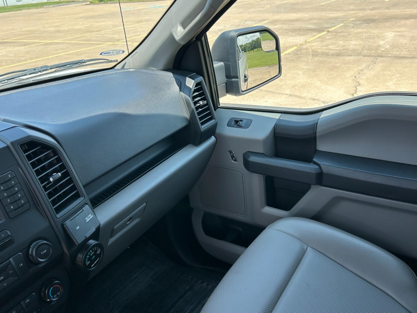 2018 White /Gray Ford F-150 XLT SuperCab 8-ft. Bed 4WD (1FTFX1E59JK) with an 5.0L V8 OHV 16V engine, AUTOMATIC transmission, located at 17760 Hwy 62, Morris, OK, 74445, (918) 733-4887, 35.609104, -95.877060 - 2018 FORD F150 HAS A 5.0L V8 ENGINE AND IS 4WD. FEATURES KEYLESS ENTERY, LEATHER INTERIOR, POWER WINDOWS, POWER LOCKS, POWER MIRRORS, AM/FM RADIO, A/C, TRACTION CONTROL, AUXILIARY PORT, BACKUP CAMERA, TILT STEERING WHEEL, BED COVER, AND BED LINER. EQUIPPED WITH A BI-FUEL CNG FUEL SYSTEM. IT RUNS ON - Photo#9