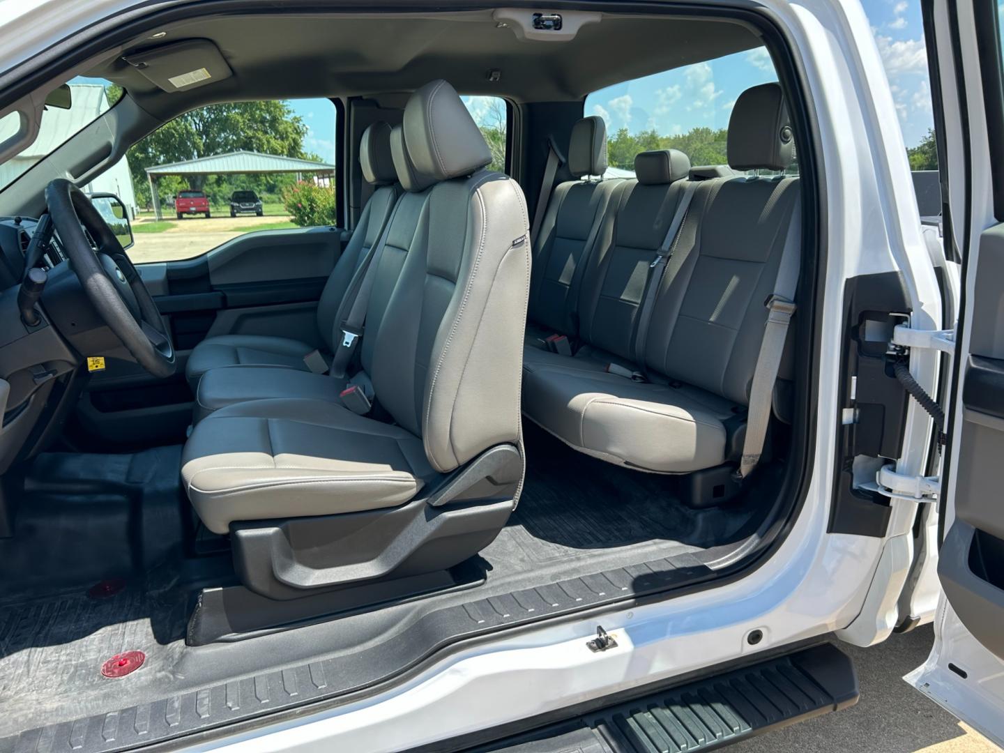 2018 White /Gray Ford F-150 XLT SuperCab 8-ft. Bed 4WD (1FTFX1E59JK) with an 5.0L V8 OHV 16V engine, AUTOMATIC transmission, located at 17760 Hwy 62, Morris, OK, 74445, (918) 733-4887, 35.609104, -95.877060 - 2018 FORD F150 HAS A 5.0L V8 ENGINE AND IS 4WD. FEATURES KEYLESS ENTERY, LEATHER INTERIOR, POWER WINDOWS, POWER LOCKS, POWER MIRRORS, AM/FM RADIO, A/C, TRACTION CONTROL, AUXILIARY PORT, BACKUP CAMERA, TILT STEERING WHEEL, BED COVER, AND BED LINER. EQUIPPED WITH A BI-FUEL CNG FUEL SYSTEM. IT RUNS ON - Photo#14