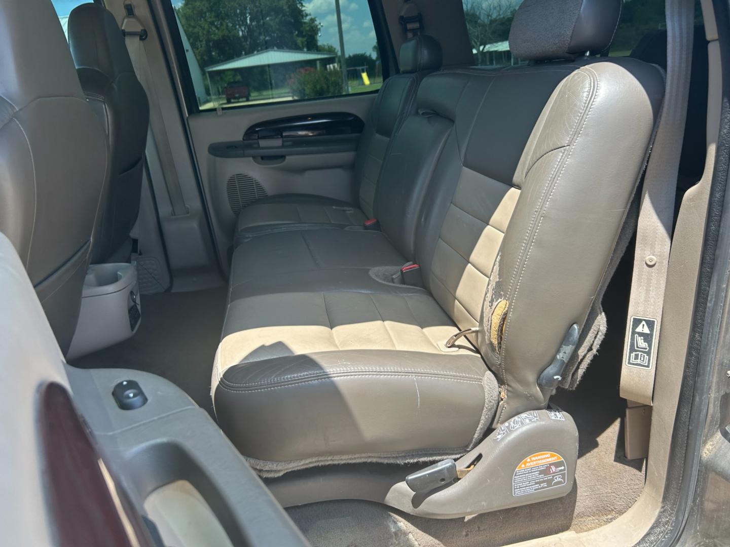 2002 GRAY /TAN Ford Excursion LIMITED (1FMNU43S32E) with an 6.8L V10 engine, AUTOMATIC transmission, located at 17760 Hwy 62, Morris, OK, 74445, (918) 733-4887, 35.609104, -95.877060 - 2002 FORD EXCURSION BI-FUEL SYSTEM (RUNS ON CNG OR GASOLINE) HAS THE 6.8L V10 ENGINE AND IS 4WD. IT FEATURES POWER SEATS, POWER LOCKS, POWER WINDOWS, POWER MIRROR, LEATHER INTERIOR, 3RD ROW SEATING, TILT WHEEL, ADJUSTABLE FOOT PEDAL, AM/FM RADIO AND CD PLAYER, A/C AND HAS REAR A/C. MILES 209,025 ** - Photo#16