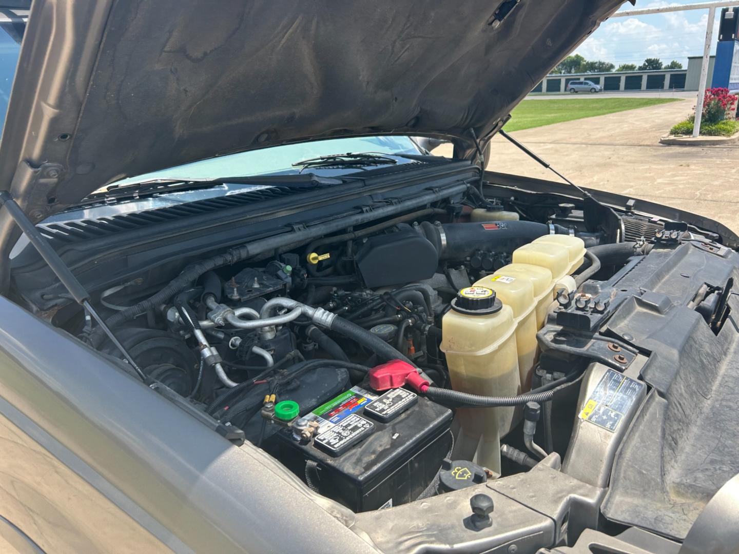 2002 GRAY /TAN Ford Excursion LIMITED (1FMNU43S32E) with an 6.8L V10 engine, AUTOMATIC transmission, located at 17760 Hwy 62, Morris, OK, 74445, (918) 733-4887, 35.609104, -95.877060 - 2002 FORD EXCURSION BI-FUEL SYSTEM (RUNS ON CNG OR GASOLINE) HAS THE 6.8L V10 ENGINE AND IS 4WD. IT FEATURES POWER SEATS, POWER LOCKS, POWER WINDOWS, POWER MIRROR, LEATHER INTERIOR, 3RD ROW SEATING, TILT WHEEL, ADJUSTABLE FOOT PEDAL, AM/FM RADIO AND CD PLAYER, A/C AND HAS REAR A/C. MILES 209,025 ** - Photo#23