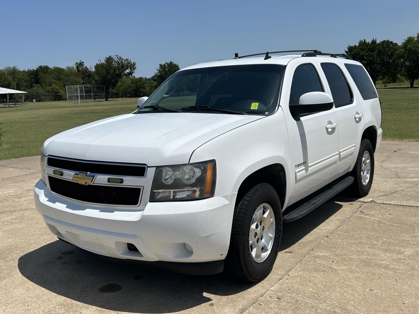 2011 White /BLACK Chevrolet Tahoe LS 4WD (1GNSKAE02BR) with an 5.3L V8 OHV 16V FFV engine, 6-Speed Automatic transmission, located at 17760 Hwy 62, Morris, OK, 74445, (918) 733-4887, 35.609104, -95.877060 - 2011 CHEVY TAHOE 5.3L V8 4WD BI-FUEL FEATURES REMOTE START, REMOTE KEYLESS ENTRY, REMOTE KEYLESS LOCKING SYSTEM, POWER WINDOWS, POWER SEATS, POWER MIRRORS, POWER LOCKS, AM/FM STEREO, CD PLAYER, BACKUP CAMERA, CLOTHS SEATS, POWER-ADJUSTABLE PEDALS, HILL ASSISTANCE, LEATHER-WRAPPED MULTI-FUNCTION STEE - Photo#1