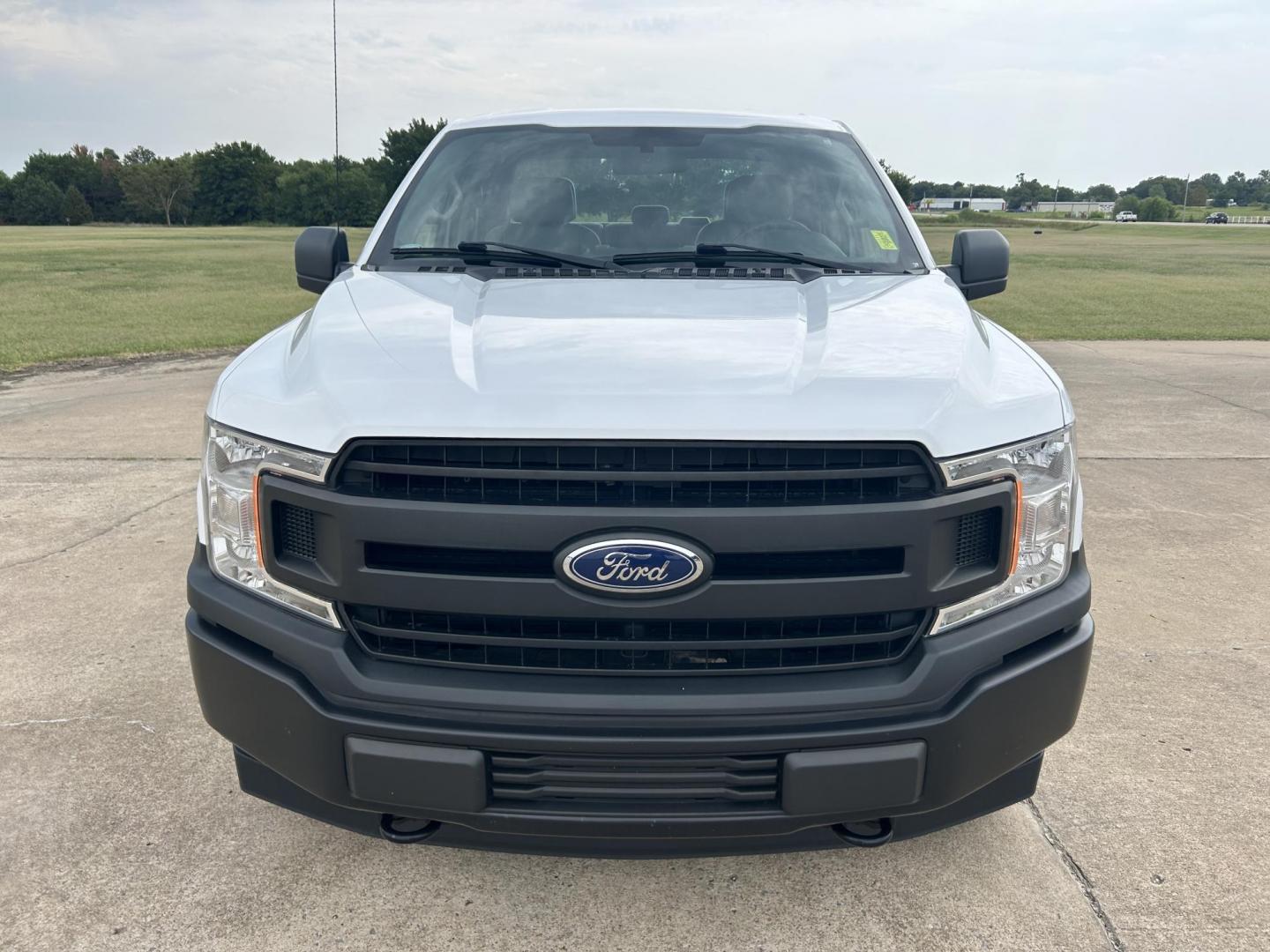 2018 White /Gray Ford F-150 SuperCab 6.5-ft. 4WD (1FTFX1E55JK) with an 5.0L V8 OHV 16V engine, 6A transmission, located at 17760 Hwy 62, Morris, OK, 74445, (918) 733-4887, 35.609104, -95.877060 - 2018 FORD F150 HAS A 5.0L V8 ENGINE AND IS 4WD. FEATURES KEYLESS ENTERY, LEATHER INTERIOR, POWER WINDOWS, POWER LOCKS, POWER MIRRORS, AM/FM RADIO, A/C, TRACTION CONTROL, AUXILIARY PORT, BACKUP CAMERA, TILT STEERING WHEEL, BED COVER, AND BED LINER. EQUIPPED WITH A BI-FUEL CNG FUEL SYSTEM. IT RUNS ON - Photo#7