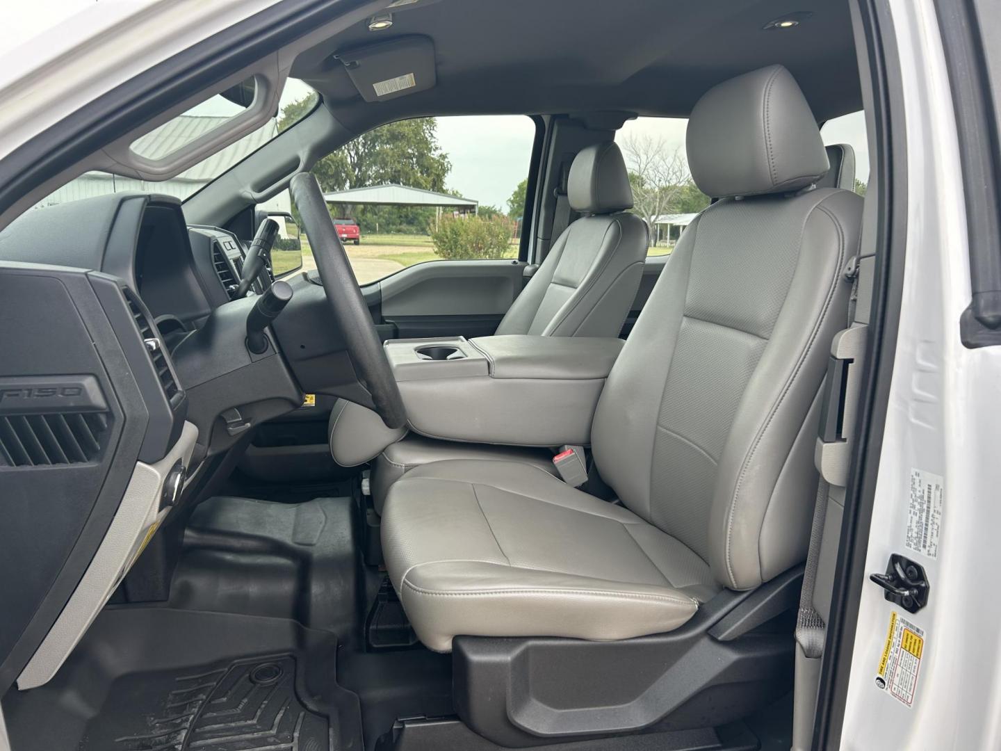 2018 White /Gray Ford F-150 SuperCab 6.5-ft. 4WD (1FTFX1E55JK) with an 5.0L V8 OHV 16V engine, 6A transmission, located at 17760 Hwy 62, Morris, OK, 74445, (918) 733-4887, 35.609104, -95.877060 - 2018 FORD F150 HAS A 5.0L V8 ENGINE AND IS 4WD. FEATURES KEYLESS ENTERY, LEATHER INTERIOR, POWER WINDOWS, POWER LOCKS, POWER MIRRORS, AM/FM RADIO, A/C, TRACTION CONTROL, AUXILIARY PORT, BACKUP CAMERA, TILT STEERING WHEEL, BED COVER, AND BED LINER. EQUIPPED WITH A BI-FUEL CNG FUEL SYSTEM. IT RUNS ON - Photo#8