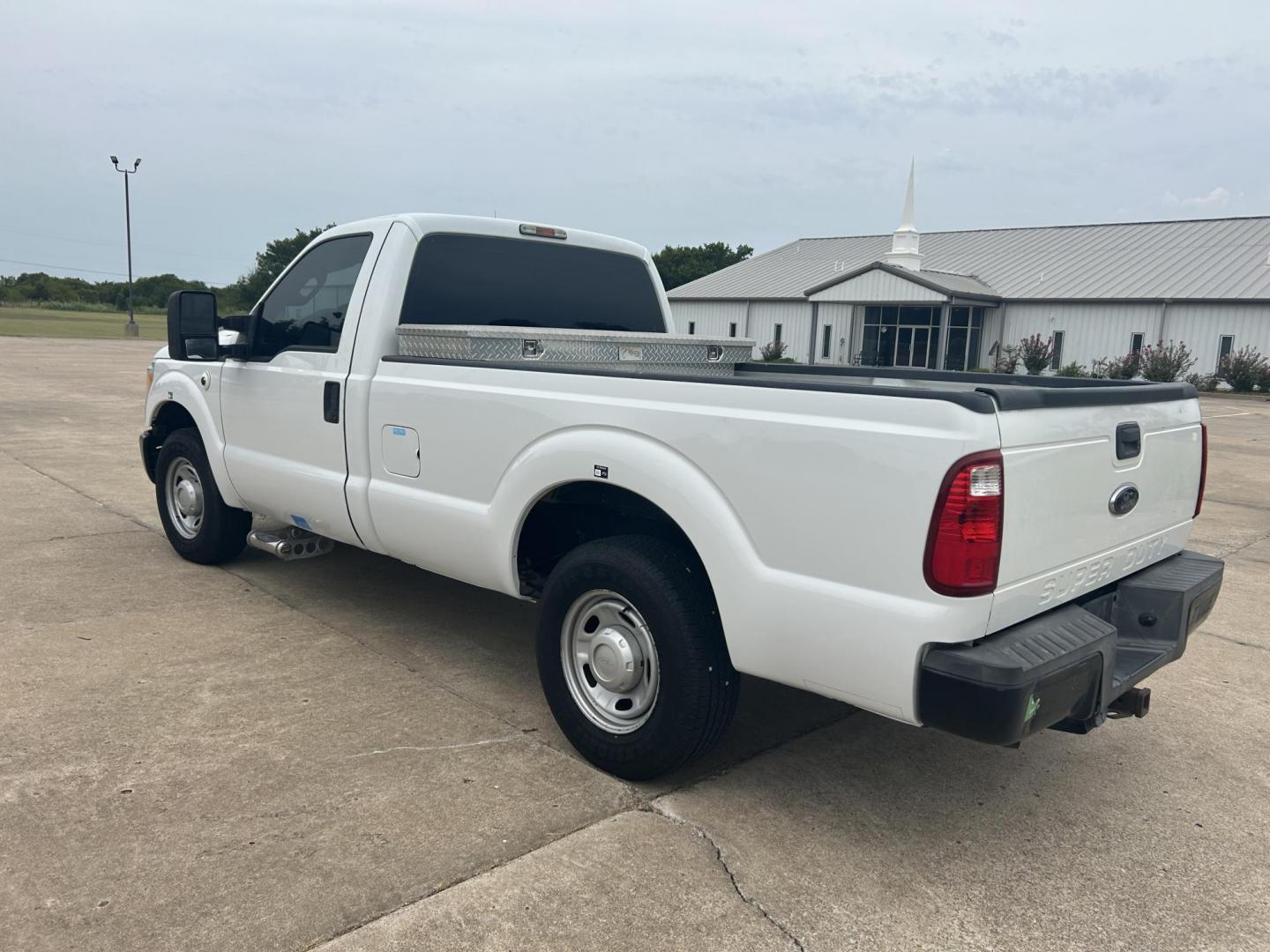 2013 White /Gray Ford F-250 SD XL 2WD (1FTBF2A69DE) with an 6.2L V8 OHV 16V engine, 6-Speed Automatic transmission, located at 17760 Hwy 62, Morris, OK, 74445, (918) 733-4887, 35.609104, -95.877060 - 2013 F250 SUPER DUTY IS A DEDICATED CNG (ONLY RUNS ON COMPRESSED NATURAL GAS). THIS TRUCK HAS A 6.2L V8 ENGINE, FEATURES MANUAL SEAT, MANUAL WINDOWS, MANUAL LOCKS, MANUAL MIRRORS, AM FM RADIO, FACTORY TRAILER BREAKS, TRACTION CONTROL, AND TRAILER HITCH. A PREMIER ALTERNATIVE FUEL CONVERSION THAT IS - Photo#10