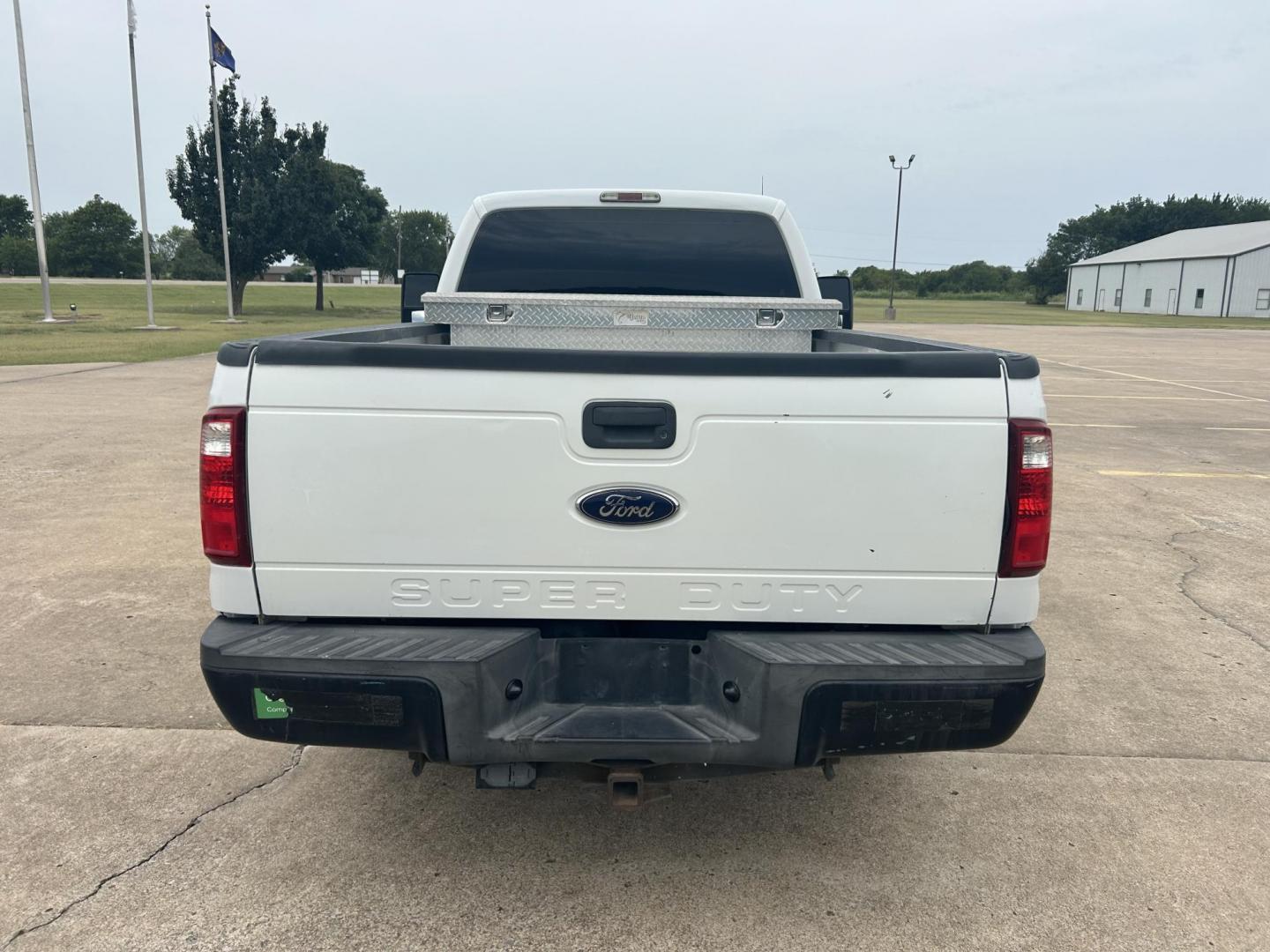 2013 White /Gray Ford F-250 SD XL 2WD (1FTBF2A69DE) with an 6.2L V8 OHV 16V engine, 6-Speed Automatic transmission, located at 17760 Hwy 62, Morris, OK, 74445, (918) 733-4887, 35.609104, -95.877060 - 2013 F250 SUPER DUTY IS A DEDICATED CNG (ONLY RUNS ON COMPRESSED NATURAL GAS). THIS TRUCK HAS A 6.2L V8 ENGINE, FEATURES MANUAL SEAT, MANUAL WINDOWS, MANUAL LOCKS, MANUAL MIRRORS, AM FM RADIO, FACTORY TRAILER BREAKS, TRACTION CONTROL, AND TRAILER HITCH. A PREMIER ALTERNATIVE FUEL CONVERSION THAT IS - Photo#13