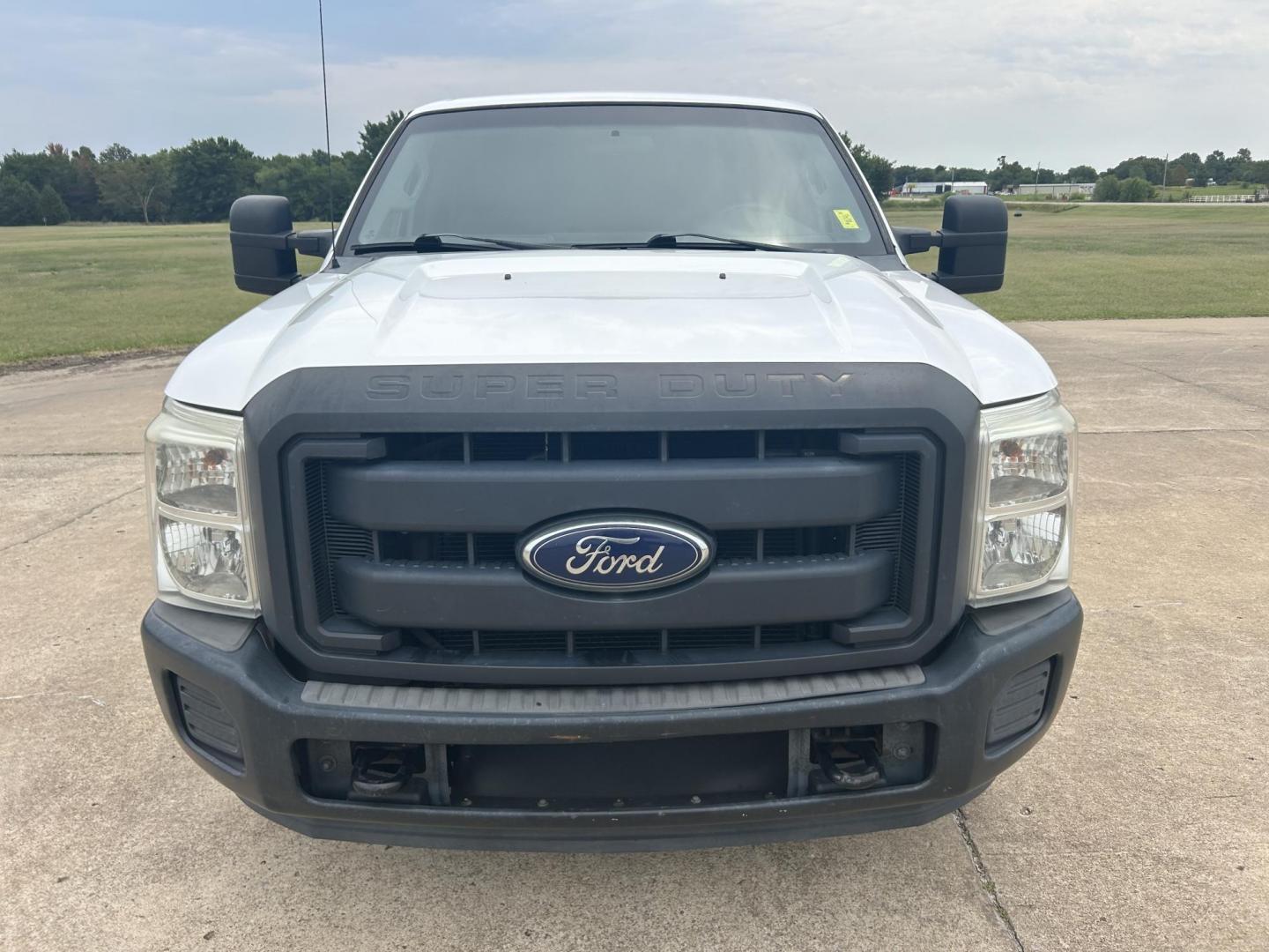 2013 White /Gray Ford F-250 SD XL 2WD (1FTBF2A69DE) with an 6.2L V8 OHV 16V engine, 6-Speed Automatic transmission, located at 17760 Hwy 62, Morris, OK, 74445, (918) 733-4887, 35.609104, -95.877060 - 2013 F250 SUPER DUTY IS A DEDICATED CNG (ONLY RUNS ON COMPRESSED NATURAL GAS). THIS TRUCK HAS A 6.2L V8 ENGINE, FEATURES MANUAL SEAT, MANUAL WINDOWS, MANUAL LOCKS, MANUAL MIRRORS, AM FM RADIO, FACTORY TRAILER BREAKS, TRACTION CONTROL, AND TRAILER HITCH. A PREMIER ALTERNATIVE FUEL CONVERSION THAT IS - Photo#2