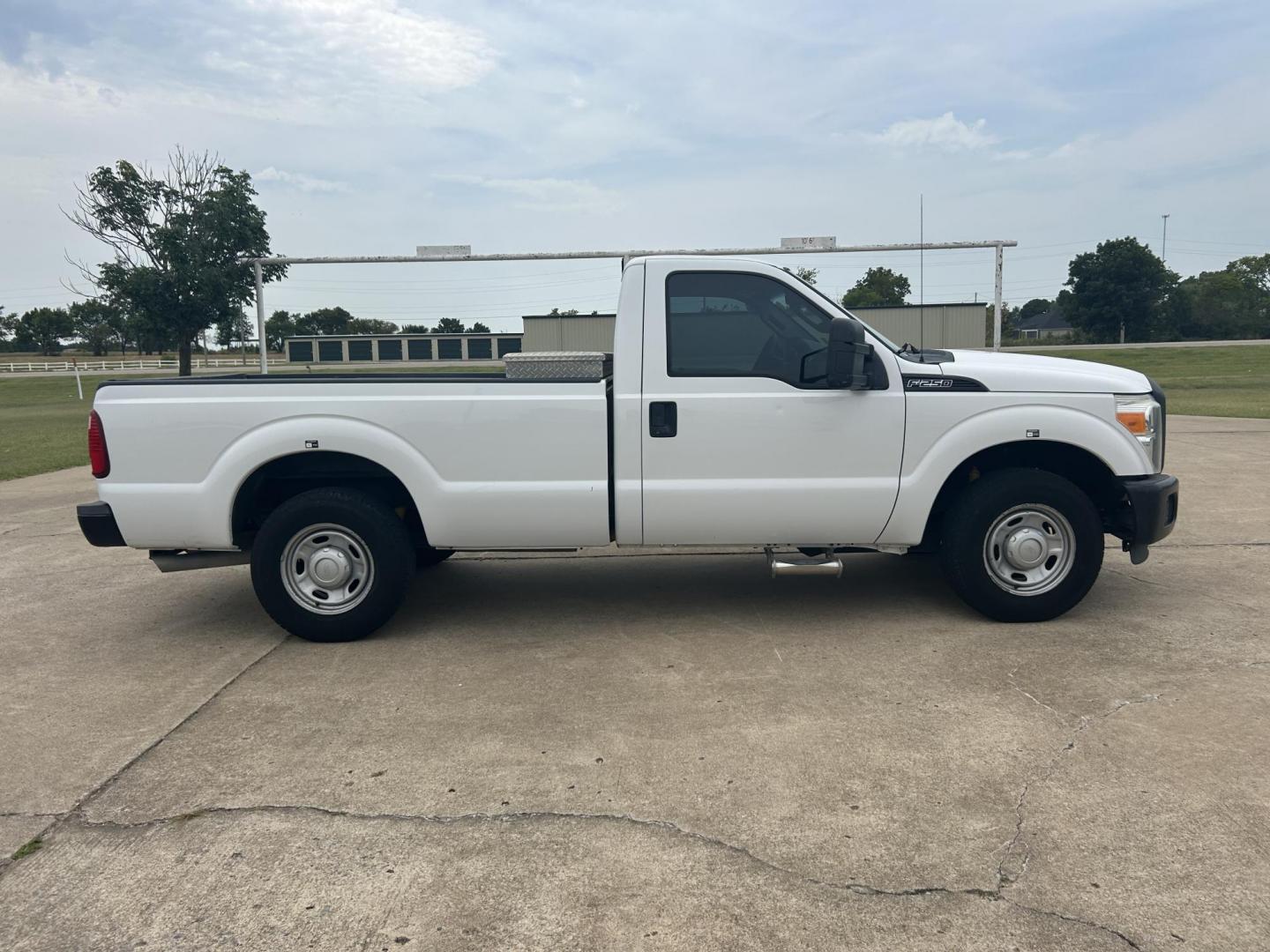 2013 White /Gray Ford F-250 SD XL 2WD (1FTBF2A69DE) with an 6.2L V8 OHV 16V engine, 6-Speed Automatic transmission, located at 17760 Hwy 62, Morris, OK, 74445, (918) 733-4887, 35.609104, -95.877060 - 2013 F250 SUPER DUTY IS A DEDICATED CNG (ONLY RUNS ON COMPRESSED NATURAL GAS). THIS TRUCK HAS A 6.2L V8 ENGINE, FEATURES MANUAL SEAT, MANUAL WINDOWS, MANUAL LOCKS, MANUAL MIRRORS, AM FM RADIO, FACTORY TRAILER BREAKS, TRACTION CONTROL, AND TRAILER HITCH. A PREMIER ALTERNATIVE FUEL CONVERSION THAT IS - Photo#6