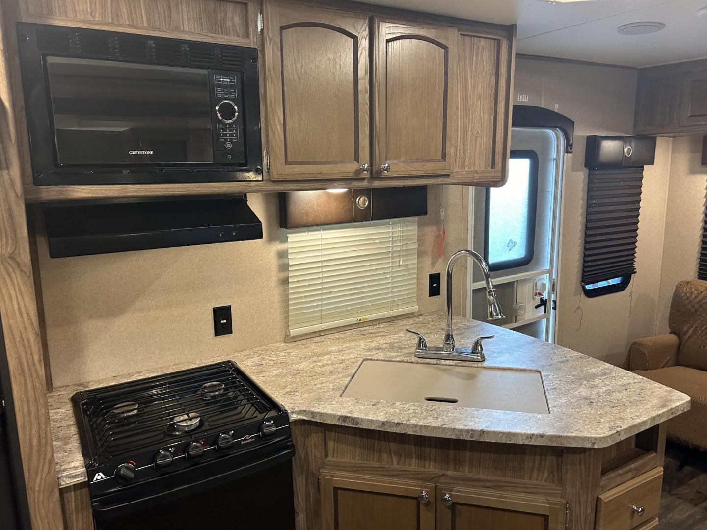 2018 /TAN Forest River Shasta Revere 27RL (5ZT2SHSB3JE) , located at 17760 Hwy 62, Morris, OK, 74445, 35.609104, -95.877060 - WE HAVE THE PERFECT CAMPER FOR YOU AND YOUR FAMILY A 2018 SHASTA REVERE 34FT. HAS A 17FT POWER AWNING. IN THE FRONT OF THE CAMPER YOU HAVE A QUEEN SIZED BED WITH STORAGE UNDERNEATH, OVERHEAD STORAGE, WARDROBE CLOSETS, CONNECTED TO THE BEDROOM IS THE BATHROOM WITH A STAND UP SHOWER, VANITY WITH MEDIC - Photo#11