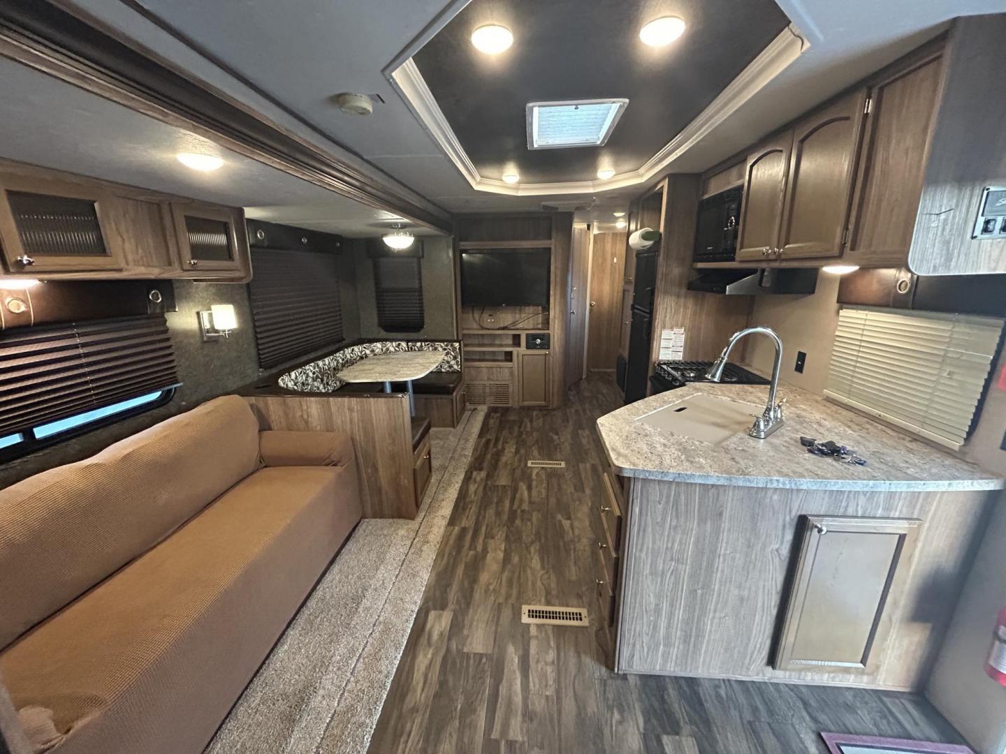 2018 /TAN Forest River Shasta Revere 27RL (5ZT2SHSB3JE) , located at 17760 Hwy 62, Morris, OK, 74445, 35.609104, -95.877060 - WE HAVE THE PERFECT CAMPER FOR YOU AND YOUR FAMILY A 2018 SHASTA REVERE 34FT. HAS A 17FT POWER AWNING. IN THE FRONT OF THE CAMPER YOU HAVE A QUEEN SIZED BED WITH STORAGE UNDERNEATH, OVERHEAD STORAGE, WARDROBE CLOSETS, CONNECTED TO THE BEDROOM IS THE BATHROOM WITH A STAND UP SHOWER, VANITY WITH MEDIC - Photo#7