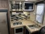 2018 White Travel Lite, Inc Unknown F22RK (55MT1KL17JP) , located at 17760 Hwy 62, Morris, OK, 74445, 35.609104, -95.877060 - WE HAVE THE PERFECT CAMPER FOR A GETAWAY TRIP. ITS A 2018 TRAVEL LITE FALCON 21FT. IT FEATURES A BOOTH STYLE DINETTE DROPS DOWN FOR ADDITIONAL SLEEPING AND STORAGE UNDERNEATH, QUEEN SIZED BED, SHIRT CLOSET, AM/FM RADIO WITH DVD PLAYER, 2 BURNER STOVE WITH STORAGE, (NO OVEN), OVERHEAD MICROWAVE, MID- - Photo#18