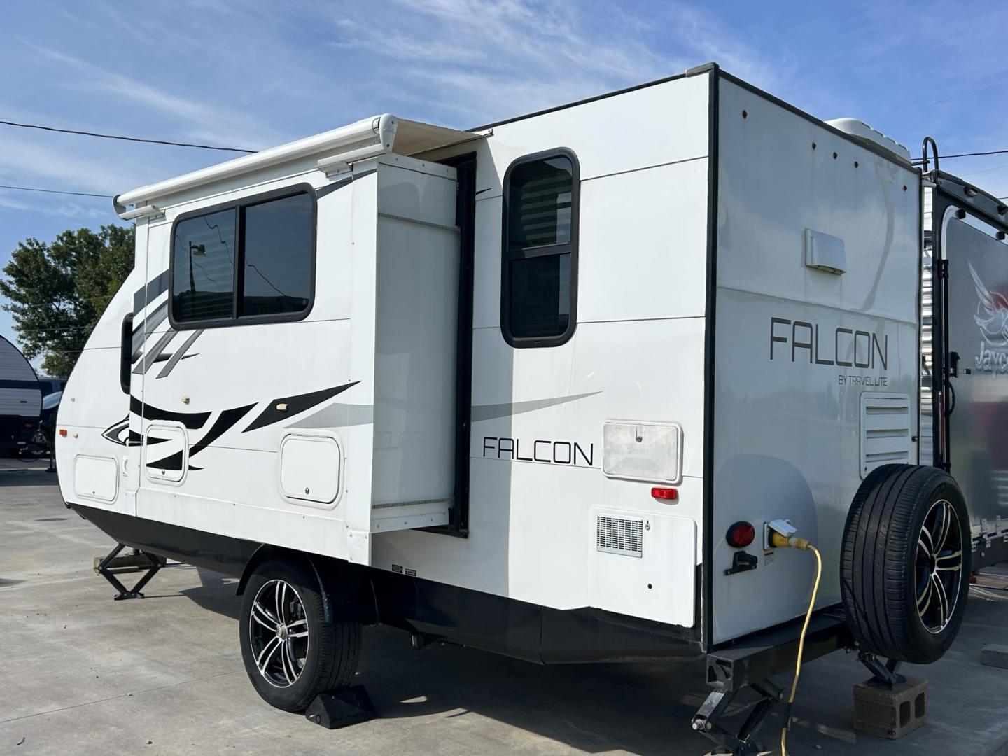 2018 White Travel Lite, Inc Unknown F22RK (55MT1KL17JP) , located at 17760 Hwy 62, Morris, OK, 74445, 35.609104, -95.877060 - WE HAVE THE PERFECT CAMPER FOR A GETAWAY TRIP. ITS A 2018 TRAVEL LITE FALCON 21FT. IT FEATURES A BOOTH STYLE DINETTE DROPS DOWN FOR ADDITIONAL SLEEPING AND STORAGE UNDERNEATH, QUEEN SIZED BED, SHIRT CLOSET, AM/FM RADIO WITH DVD PLAYER, 2 BURNER STOVE WITH STORAGE, (NO OVEN), OVERHEAD MICROWAVE, MID- - Photo#5