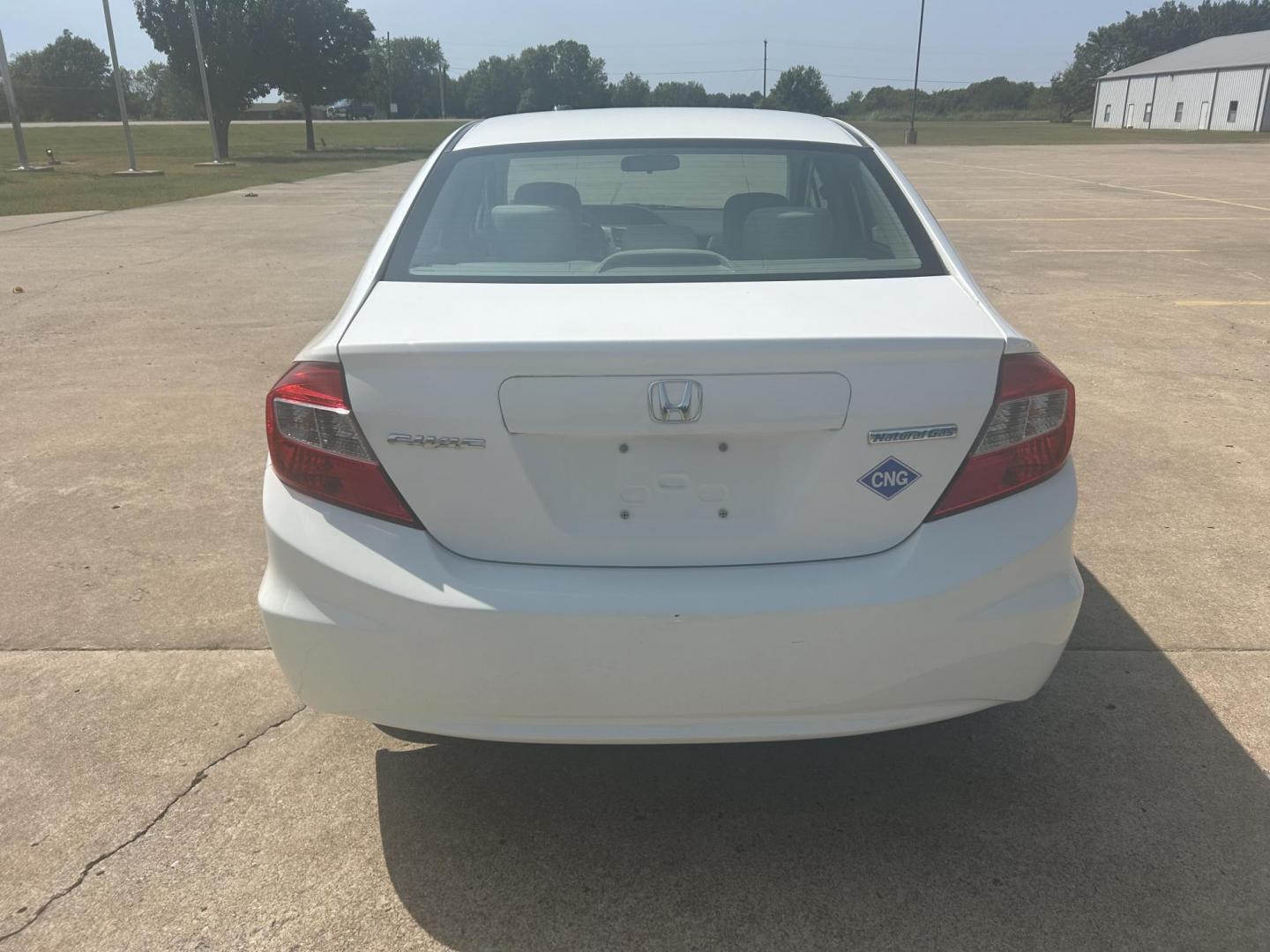 2012 White /Gray Honda Civic CNG Sedan 5-Speed AT (19XFB5F53CE) with an 1.8L L4 SOHC 16V CNG engine, 5-Speed Automatic transmission, located at 17760 Hwy 62, Morris, OK, 74445, (918) 733-4887, 35.609104, -95.877060 - 2012 HONDA CIVIC DEDICATED CNG (COMPRESSED NATURAL GAS) HAS A 1.8L 4 CYLINDER ENGINE AND IS 2WD FEATURES KEYLESS ENTRY, MANUAL SEATS, CLOTH INTERIOR, AM/FM RADIO WITH CD PLAYER, AUXILIARY PORT, USB PORT, POWER WINDOWS, POWER LOCKS, POWER MIRROR, MULTI FUNCTION STEERING WHEEL, HAND FREE CALLING, CRUI - Photo#3