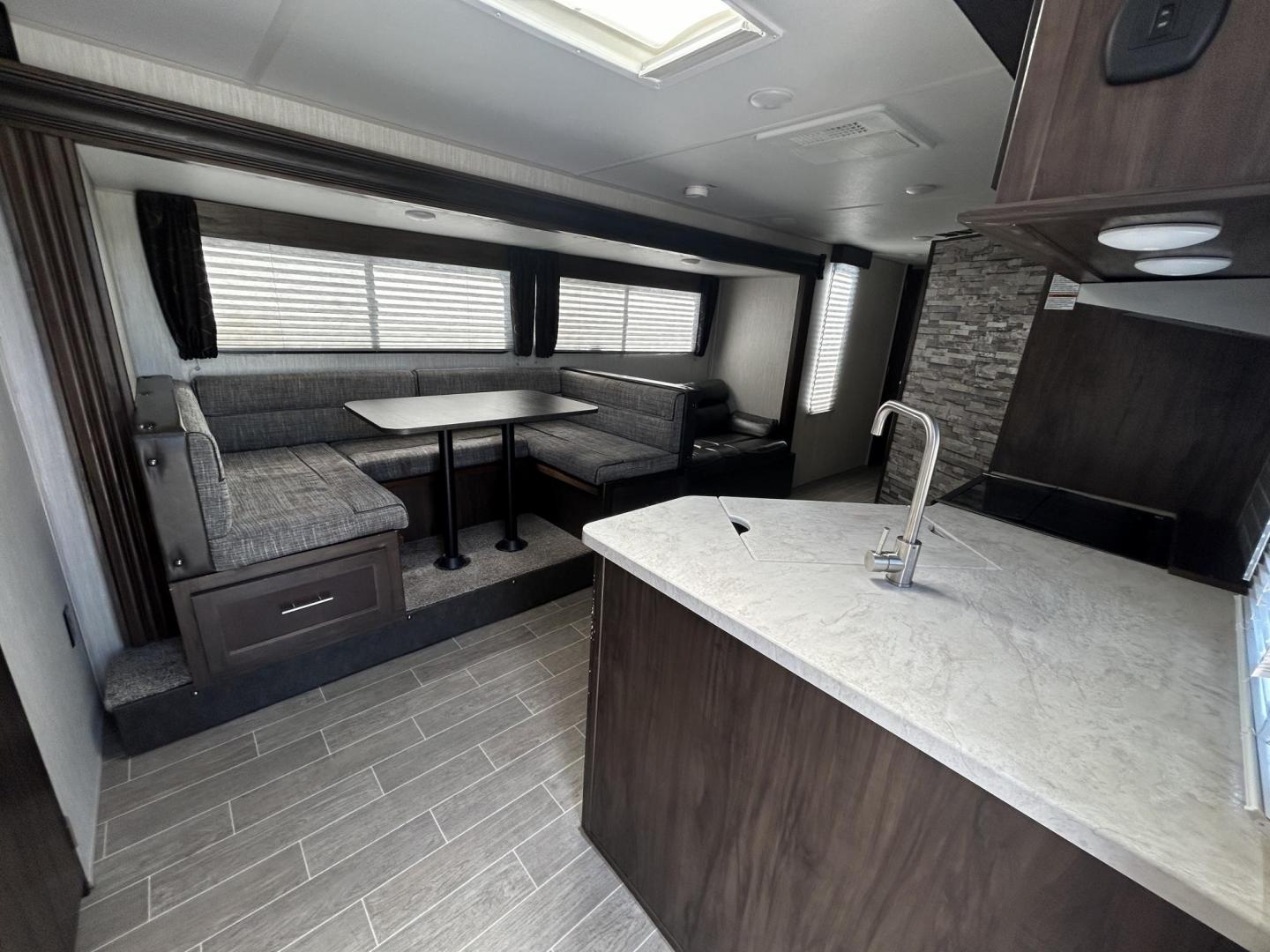 2020 GRAY /Gray Forest River PATRIOT 29TE (4X4TCKE28LX) , located at 17760 Hwy 62, Morris, OK, 74445, 35.609104, -95.877060 - HERE IS THE PERFECT FAMILY CAMPER FOR YOU AND YOUR FAMILY. A 2020 FOREST RIVER PATRIOT 36.5FT. IT FEATURES,1 SLIDE OUT, POWER ANWING 15FT, POWER STABILIZERS JACKS, 2 OUTSIDE STORAGE, OUTSIDE KITCHEN WITH A 2 BURNER STOVE, MINI FRIDGE, SINK WITH OVERHEAD STORAGE, HAS ICE MAKER, LEASH LATCH FOR ANIMAL - Photo#19