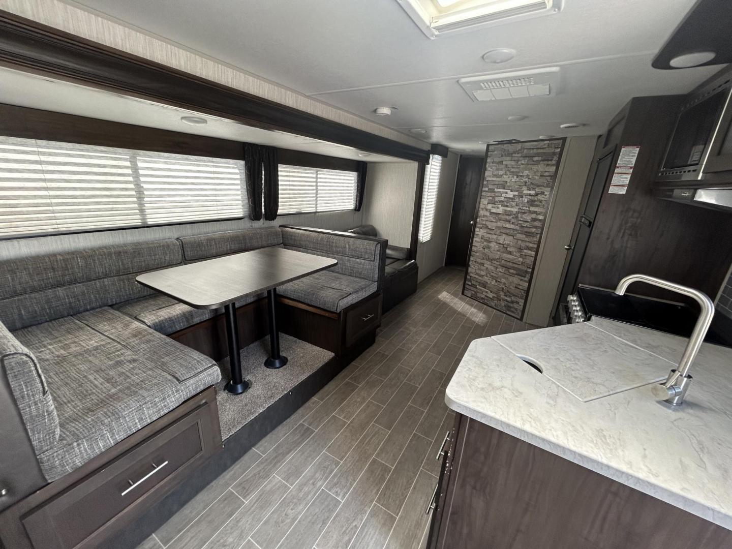 2020 GRAY /Gray Forest River PATRIOT 29TE (4X4TCKE28LX) , located at 17760 Hwy 62, Morris, OK, 74445, 35.609104, -95.877060 - HERE IS THE PERFECT FAMILY CAMPER FOR YOU AND YOUR FAMILY. A 2020 FOREST RIVER PATRIOT 36.5FT. IT FEATURES,1 SLIDE OUT, POWER ANWING 15FT, POWER STABILIZERS JACKS, 2 OUTSIDE STORAGE, OUTSIDE KITCHEN WITH A 2 BURNER STOVE, MINI FRIDGE, SINK WITH OVERHEAD STORAGE, HAS ICE MAKER, LEASH LATCH FOR ANIMAL - Photo#27