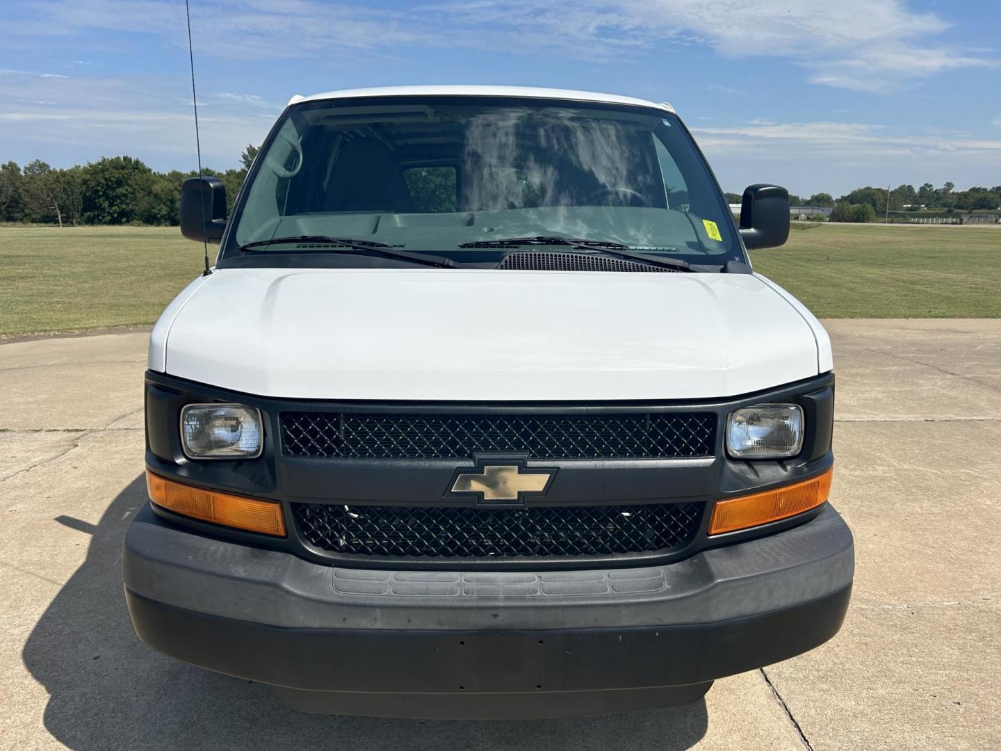 2014 White /Gray Chevrolet Express 2500 Cargo (1GCWGFCB8E1) with an 6.0L V8 OHV 16V CNG engine, 6A transmission, located at 17760 Hwy 62, Morris, OK, 74445, (918) 733-4887, 35.609104, -95.877060 - 2014 CHEVROLET EXPRESS CARGO VAN IS A DEDICATED CNG ONLY RUNS ON COMPRESSED NATURAL GAS. IT FEATURES A 6.0L V8, RWD, POWER LOCKS, POWER WINDOWS, MANUAL MIRRORS, MANUAL SEATS, AM/FM STEREO, LEATHER SEATS, TRACTION CONTROL, SPLIT SWING-OUT RIGHT DOORS, AND TOW PACKAGE. EQUIPPED WITH A CNG FUEL SYSTE - Photo#0