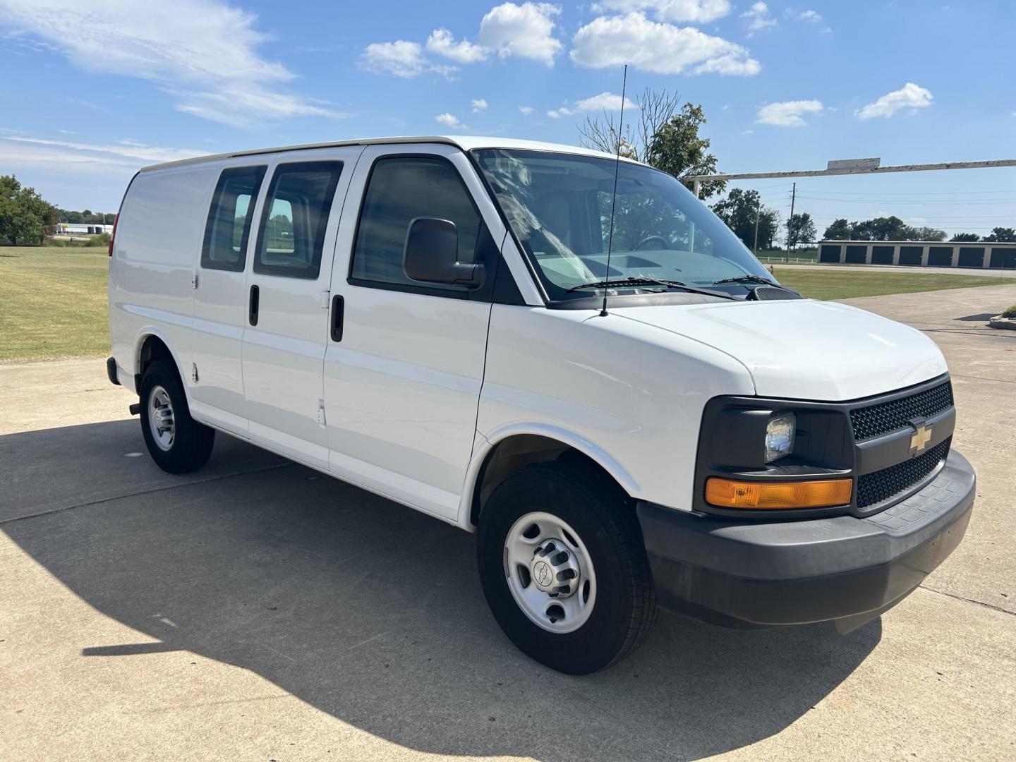 2014 White /Gray Chevrolet Express 2500 Cargo (1GCWGFCB8E1) with an 6.0L V8 OHV 16V CNG engine, 6A transmission, located at 17760 Hwy 62, Morris, OK, 74445, (918) 733-4887, 35.609104, -95.877060 - 2014 CHEVROLET EXPRESS CARGO VAN IS A DEDICATED CNG ONLY RUNS ON COMPRESSED NATURAL GAS. IT FEATURES A 6.0L V8, RWD, POWER LOCKS, POWER WINDOWS, MANUAL MIRRORS, MANUAL SEATS, AM/FM STEREO, LEATHER SEATS, TRACTION CONTROL, SPLIT SWING-OUT RIGHT DOORS, AND TOW PACKAGE. EQUIPPED WITH A CNG FUEL SYSTE - Photo#1