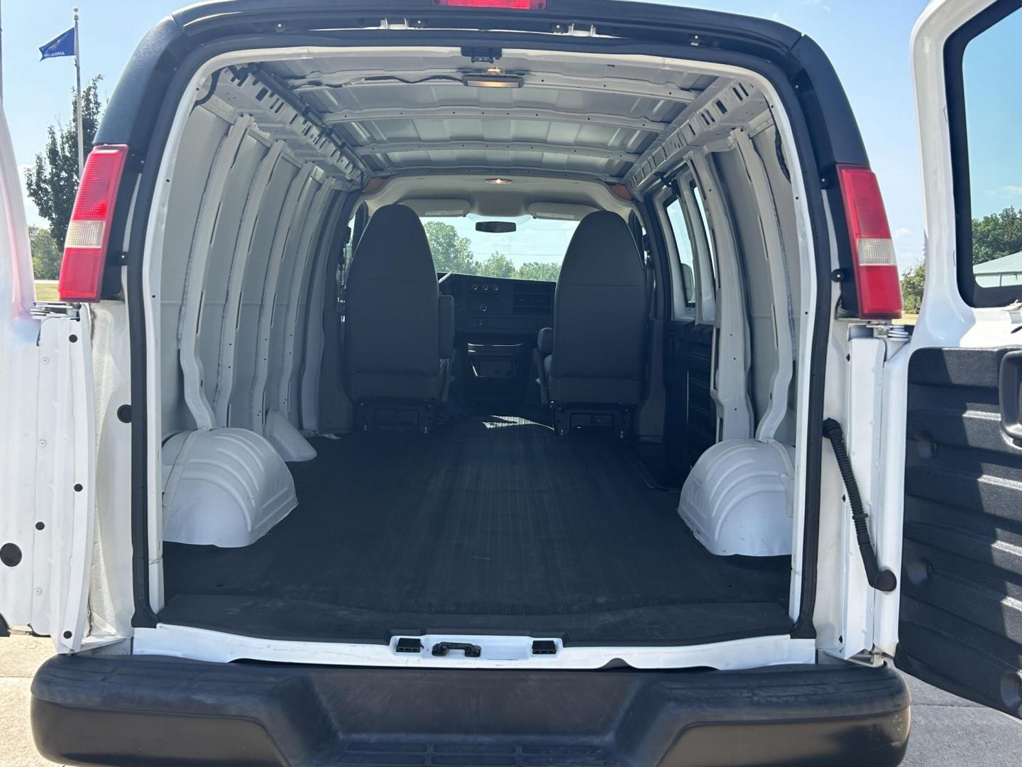 2014 White /Gray Chevrolet Express 2500 Cargo (1GCWGFCB8E1) with an 6.0L V8 OHV 16V CNG engine, 6A transmission, located at 17760 Hwy 62, Morris, OK, 74445, (918) 733-4887, 35.609104, -95.877060 - 2014 CHEVROLET EXPRESS CARGO VAN IS A DEDICATED CNG ONLY RUNS ON COMPRESSED NATURAL GAS. IT FEATURES A 6.0L V8, RWD, POWER LOCKS, POWER WINDOWS, MANUAL MIRRORS, MANUAL SEATS, AM/FM STEREO, LEATHER SEATS, TRACTION CONTROL, SPLIT SWING-OUT RIGHT DOORS, AND TOW PACKAGE. EQUIPPED WITH A CNG FUEL SYSTE - Photo#13