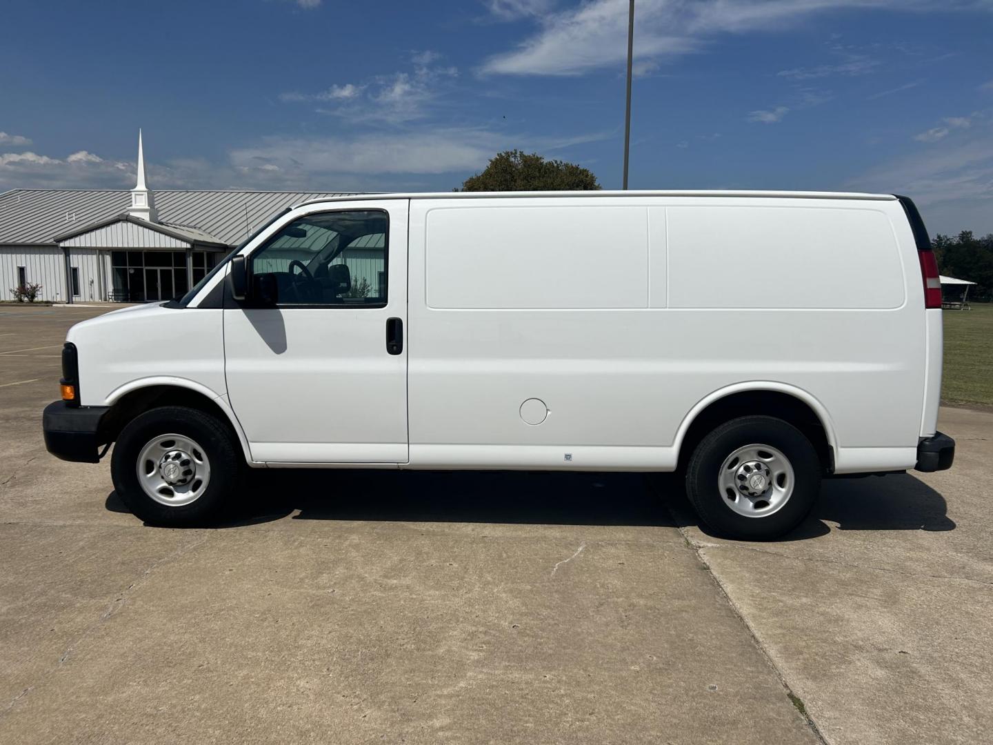 2014 White /Gray Chevrolet Express 2500 Cargo (1GCWGFCB8E1) with an 6.0L V8 OHV 16V CNG engine, 6A transmission, located at 17760 Hwy 62, Morris, OK, 74445, (918) 733-4887, 35.609104, -95.877060 - 2014 CHEVROLET EXPRESS CARGO VAN IS A DEDICATED CNG ONLY RUNS ON COMPRESSED NATURAL GAS. IT FEATURES A 6.0L V8, RWD, POWER LOCKS, POWER WINDOWS, MANUAL MIRRORS, MANUAL SEATS, AM/FM STEREO, LEATHER SEATS, TRACTION CONTROL, SPLIT SWING-OUT RIGHT DOORS, AND TOW PACKAGE. EQUIPPED WITH A CNG FUEL SYSTE - Photo#8