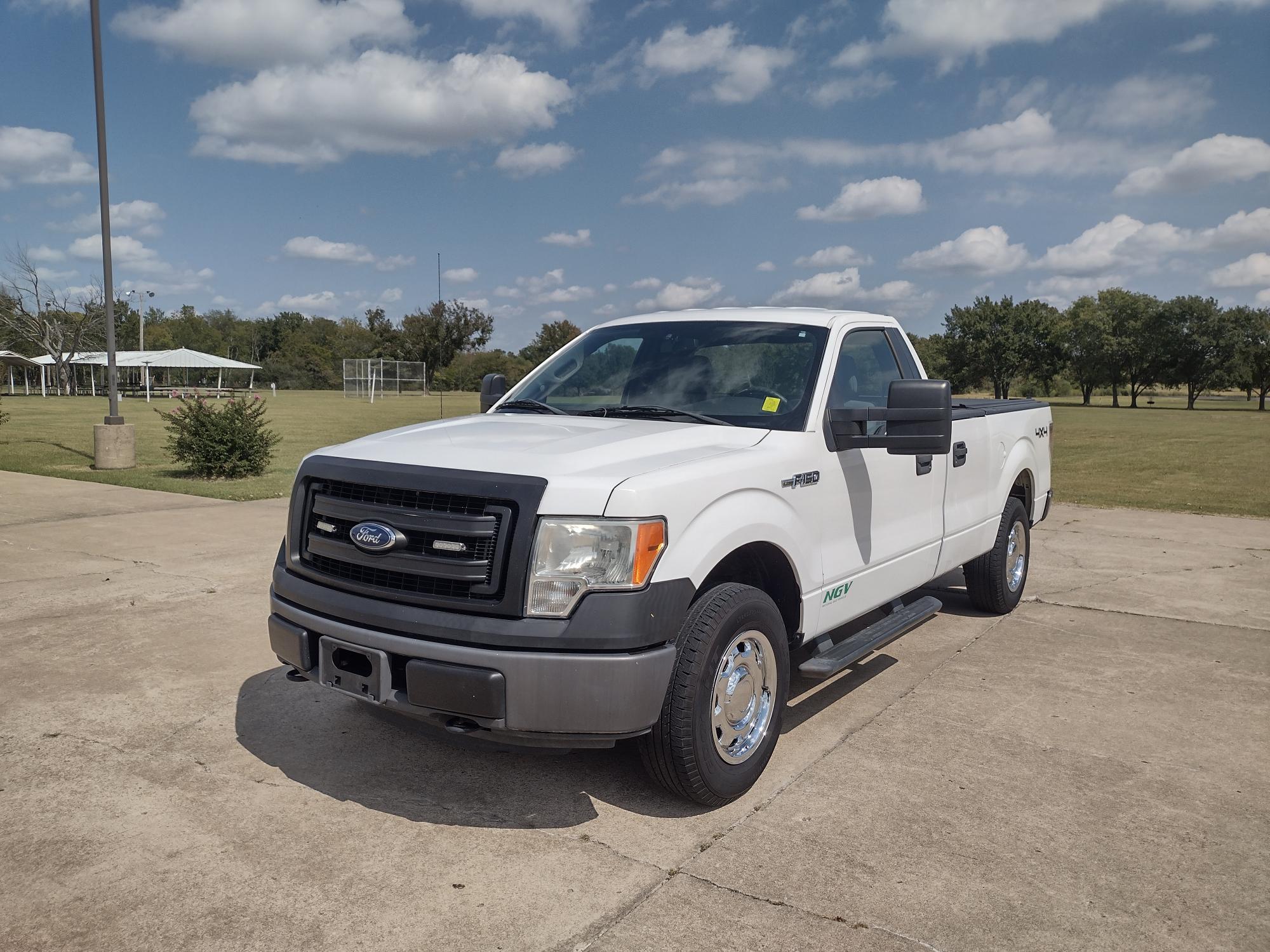 photo of 2014 Ford F-150 5FT AND 6IN Bed 4WD BI-FUEL SYSTEM (RUNS ON BOTH CNG OR GASOLINE) $990 TAX CREDIT AVAILABLE 