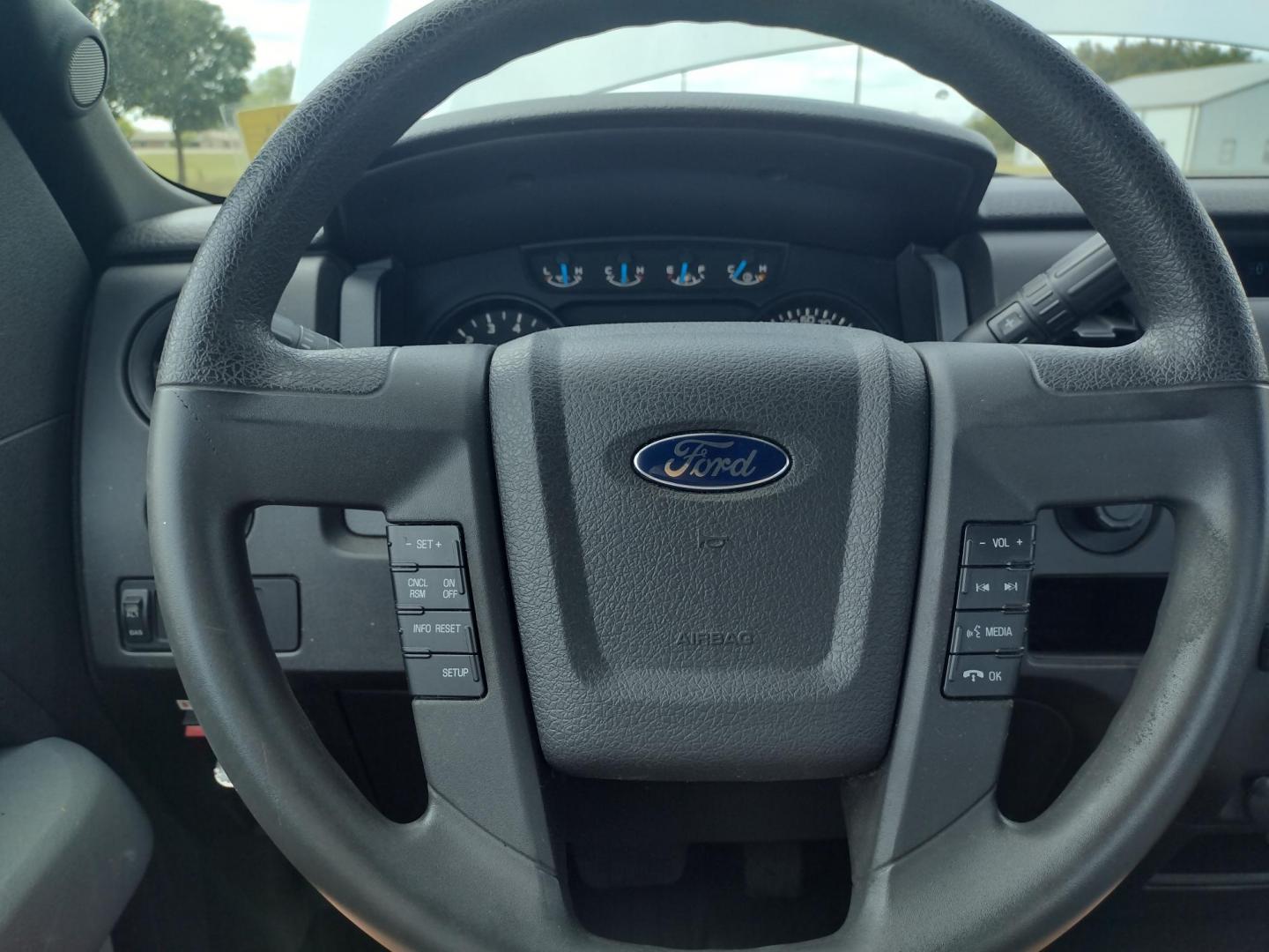 2014 White /Gray Ford F-150 (1FTMF1EM8EK) with an 3.7L V6 DOHC 24V engine, 6-Speed Automatic transmission, located at 17760 Hwy 62, Morris, OK, 74445, (918) 733-4887, 35.609104, -95.877060 - Photo#21