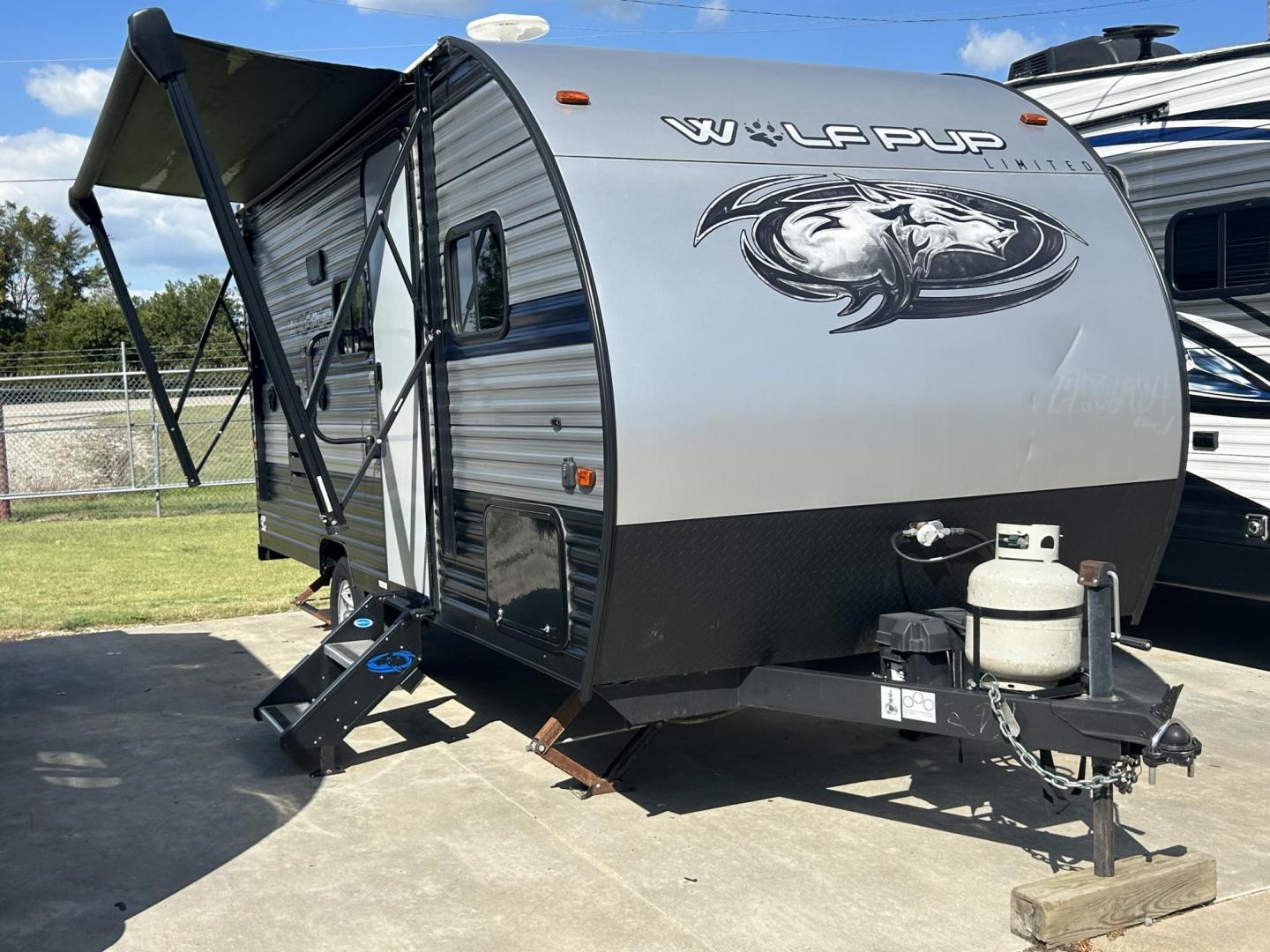 2019 Silver /TAN Forest River Cherokee 16BHS (5ZT2CKEC3KY) , located at 17760 Hwy 62, Morris, OK, 74445, 35.609104, -95.877060 - WE HAVE THE PREFECT GETAWAY CAMPER FOR YOU AND YOUR FAMILY. A 2019 FOREST RIVER WILDWOOD WOLFPUP OVERALL 22FT. IT FEATURES 10FT POWER AWNING, MANUAL JACKS, AMFM RADIO,OUTSIDE SHOWER, OUTSIDE STORAGEEMERGENCY DOOR. IN THE FRONT YOU HAVE A QUEEN SIZED BED WITH STORAGE UNDERNEATH, OVERHEAD STORAGE, IN - Photo#1