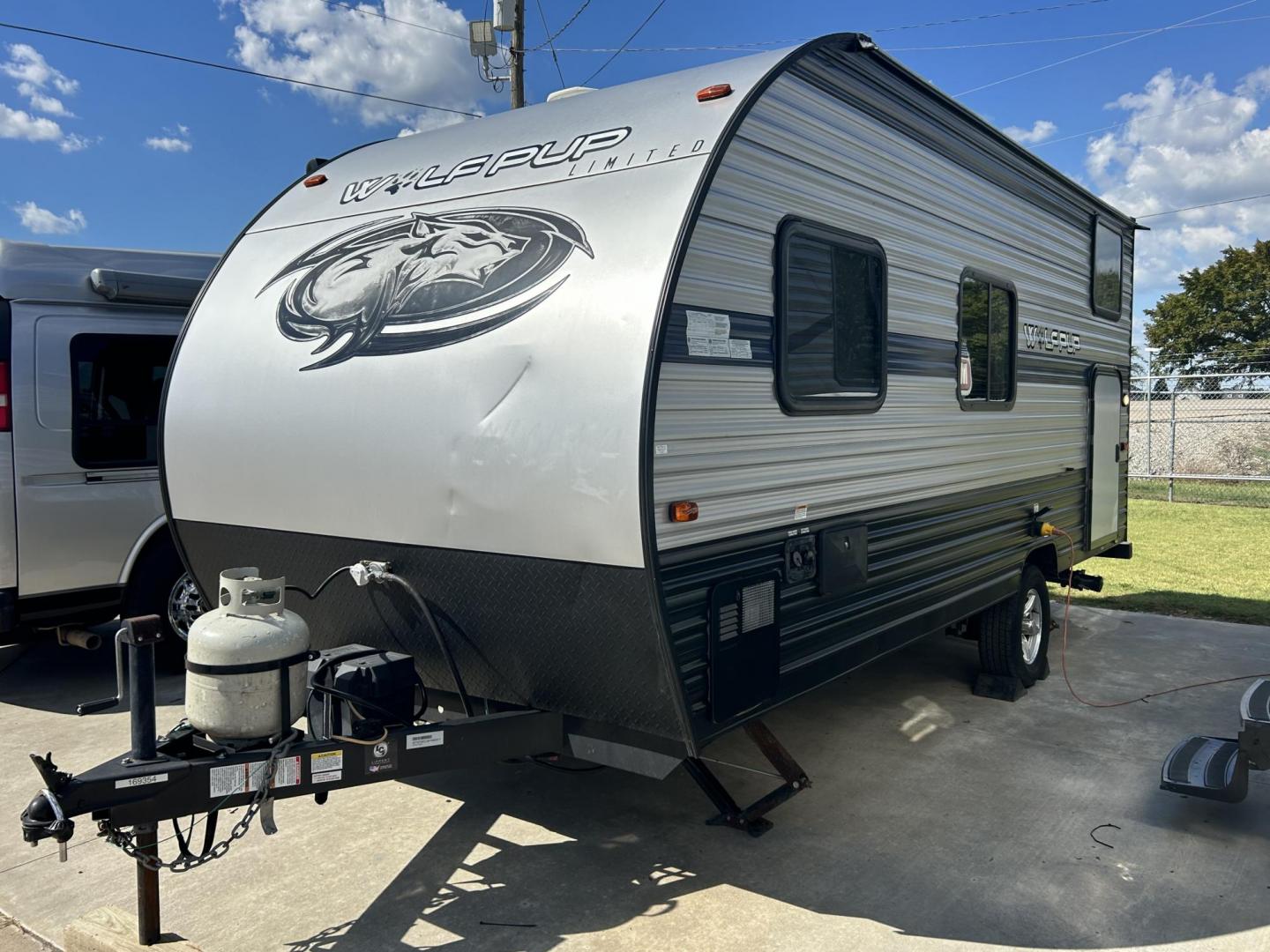 2019 Silver /TAN Forest River Cherokee 16BHS (5ZT2CKEC3KY) , located at 17760 Hwy 62, Morris, OK, 74445, 35.609104, -95.877060 - WE HAVE THE PREFECT GETAWAY CAMPER FOR YOU AND YOUR FAMILY. A 2019 FOREST RIVER WILDWOOD WOLFPUP OVERALL 22FT. IT FEATURES 10FT POWER AWNING, MANUAL JACKS, AMFM RADIO,OUTSIDE SHOWER, OUTSIDE STORAGEEMERGENCY DOOR. IN THE FRONT YOU HAVE A QUEEN SIZED BED WITH STORAGE UNDERNEATH, OVERHEAD STORAGE, IN - Photo#4